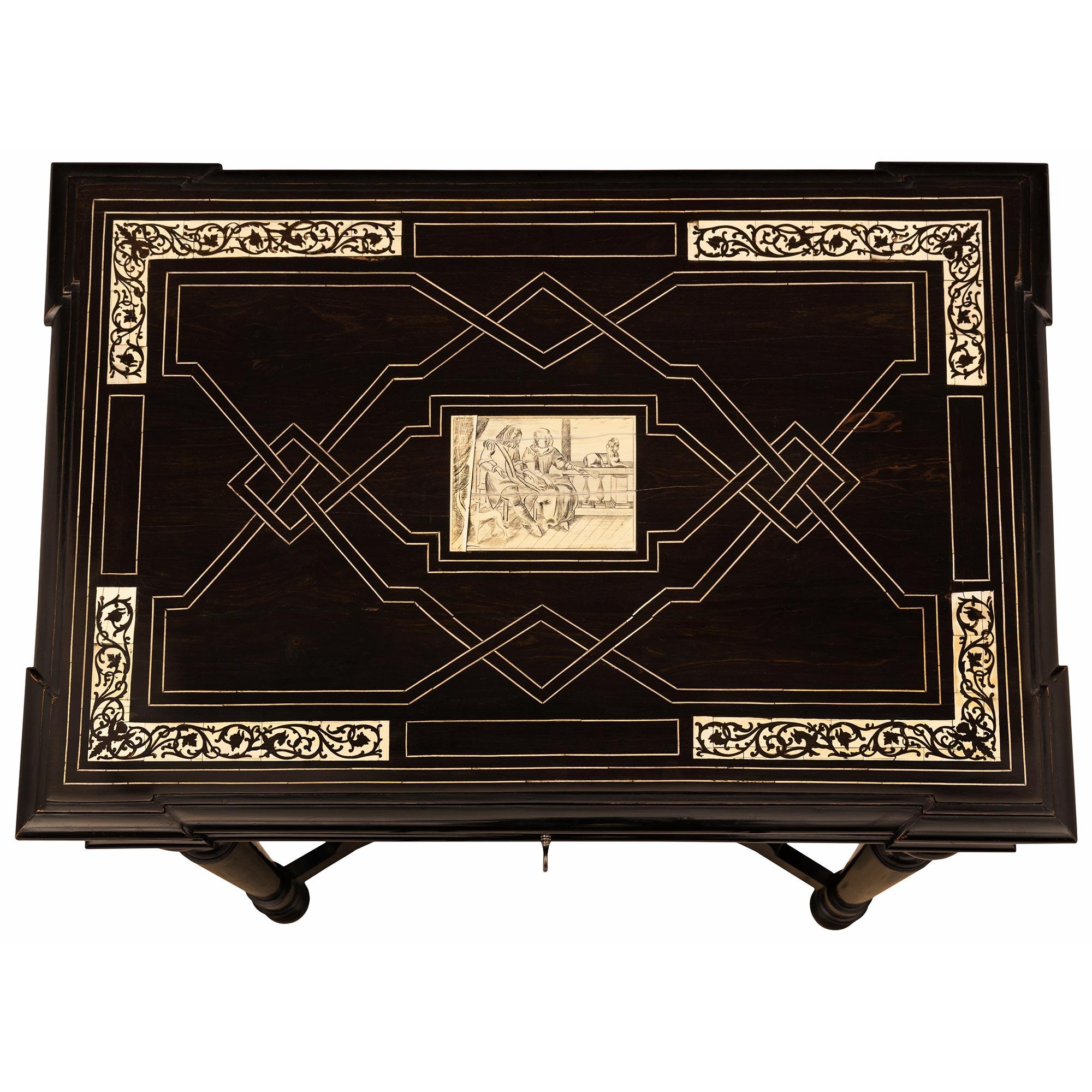 A striking Italian 19th century ebony, ivory, and ormolu center/side table. The one drawer rectangular table is raised by four elegant turned tapered legs with charming topie shaped feet and each connected by a beautiful scalloped shaped stretcher