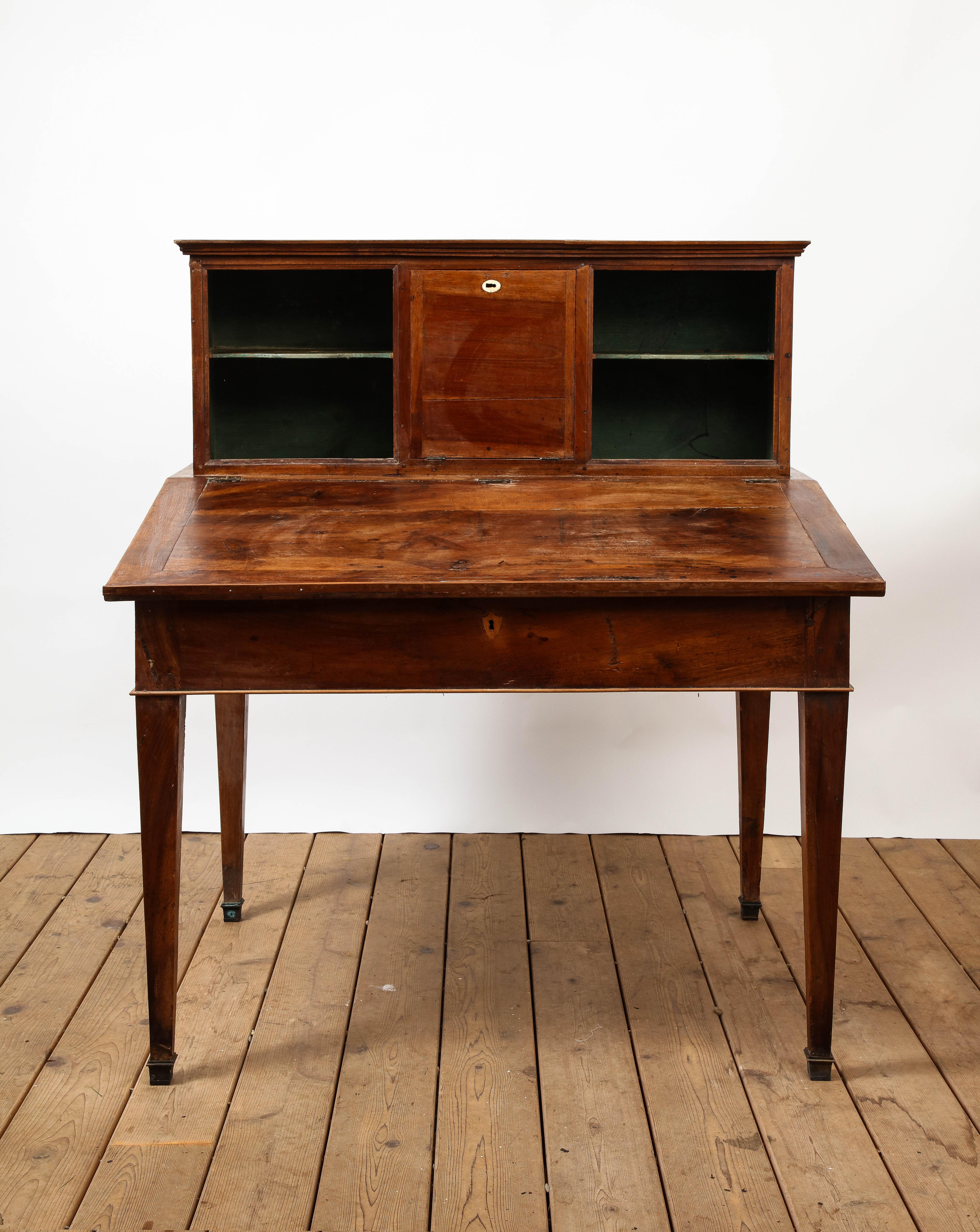 19th century Italian fruitwood antique desk with storage and shelves. Interior storage has original green paint; original hardware and locks. Square sabots. 

Additional Dimensions:
upper cabinet 16