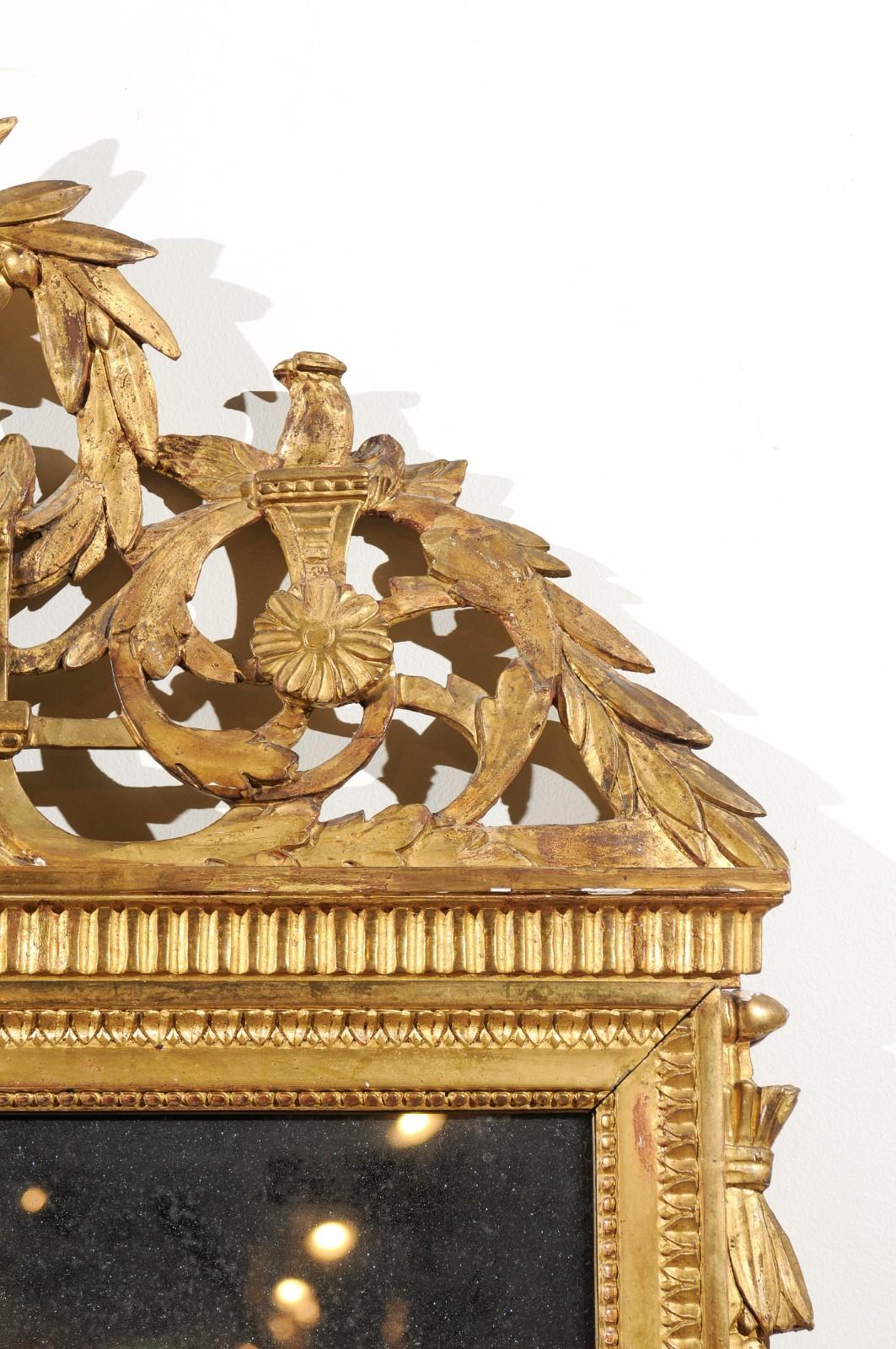 Italian 19th Century Giltwood Crested Mirror with Carved Birds and Olive Wreath In Good Condition In Atlanta, GA