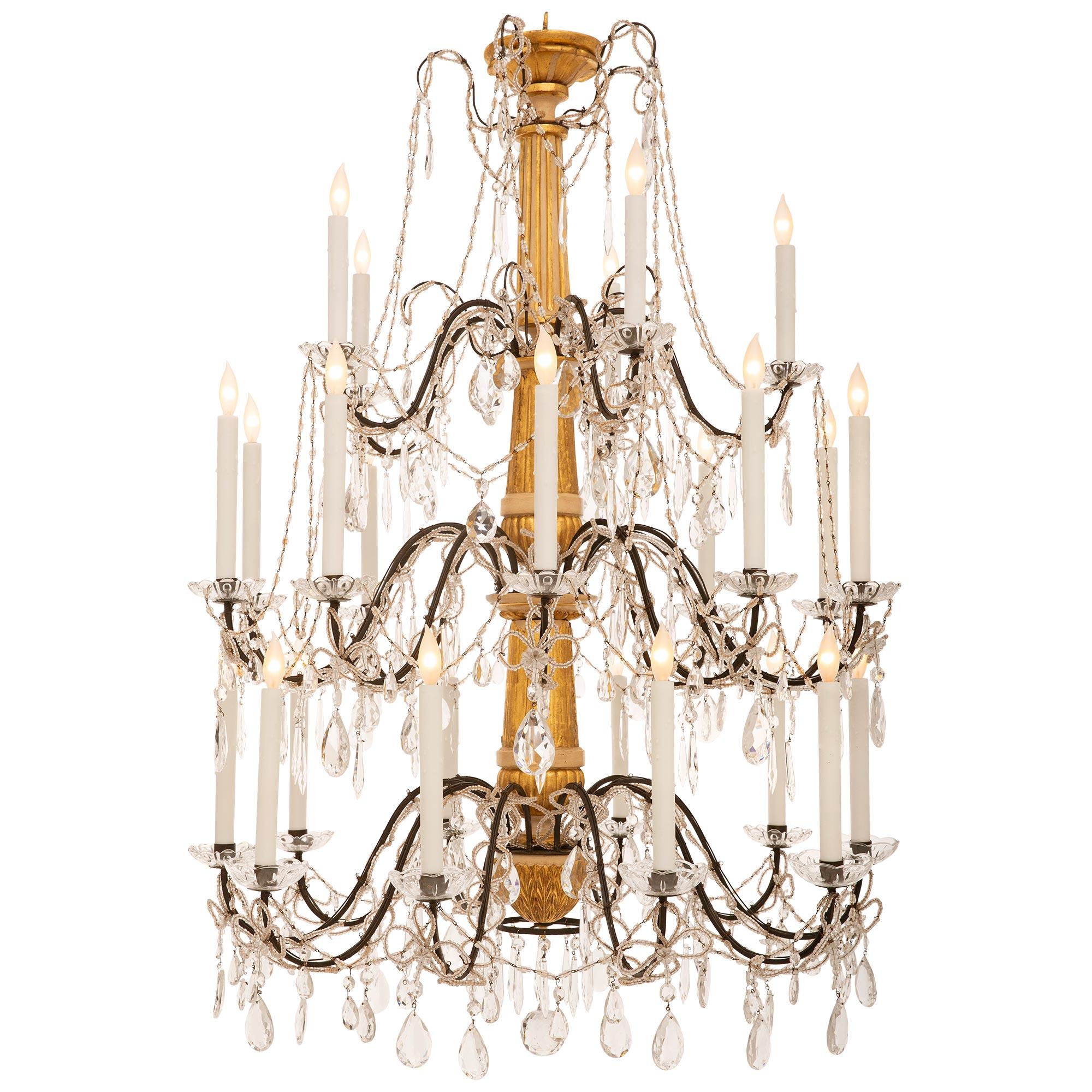 Italian 19th Century Giltwood, Patinated Wood, Iron And Crystal Chandelier In Good Condition For Sale In West Palm Beach, FL