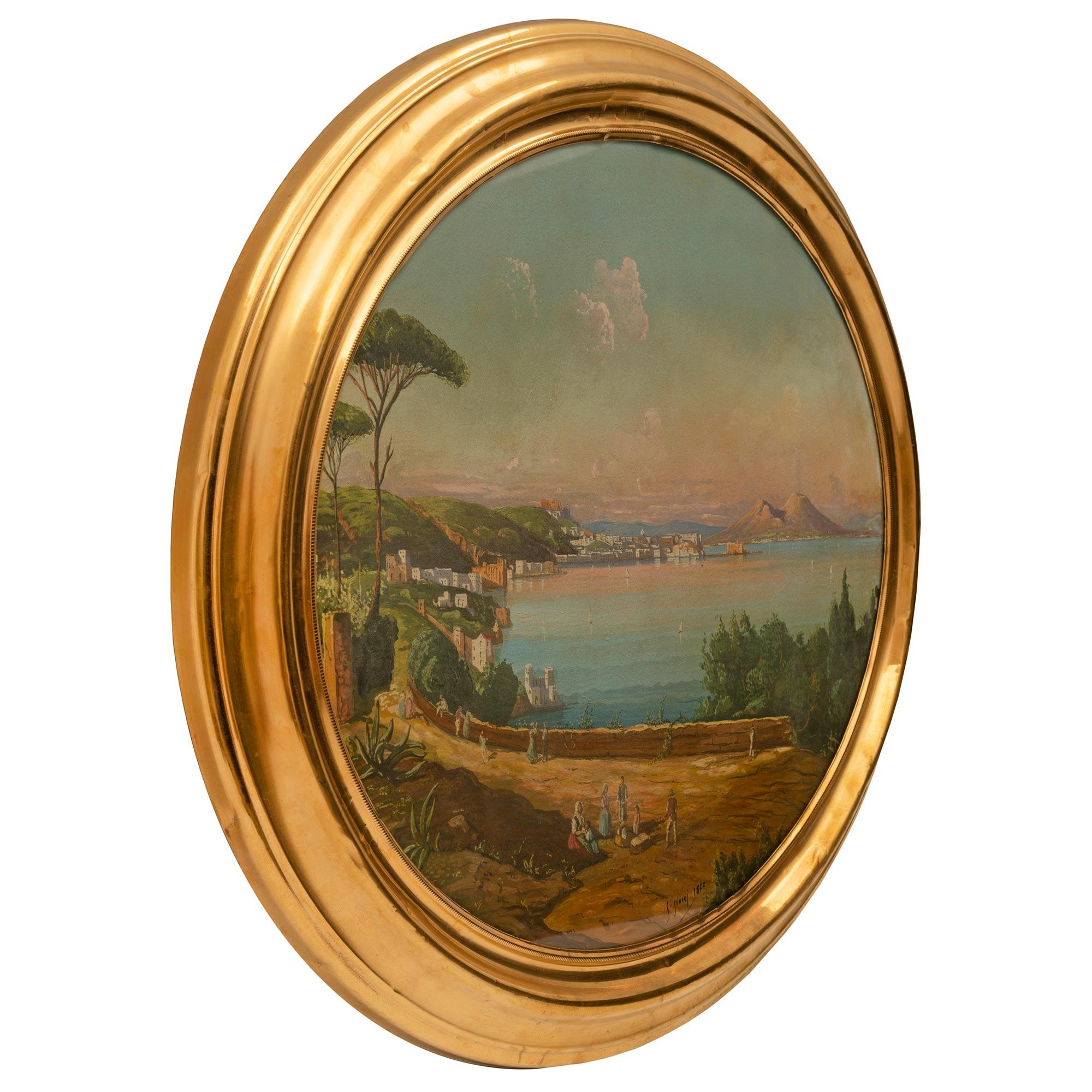 A beautiful Italian 19th century gouache set in its original ormolu frame. The lovely oblong painting depicts the beautiful bay of Naples on a gorgeous day with mount Vesuvius in the background and lovely sail boats and charming personages in the