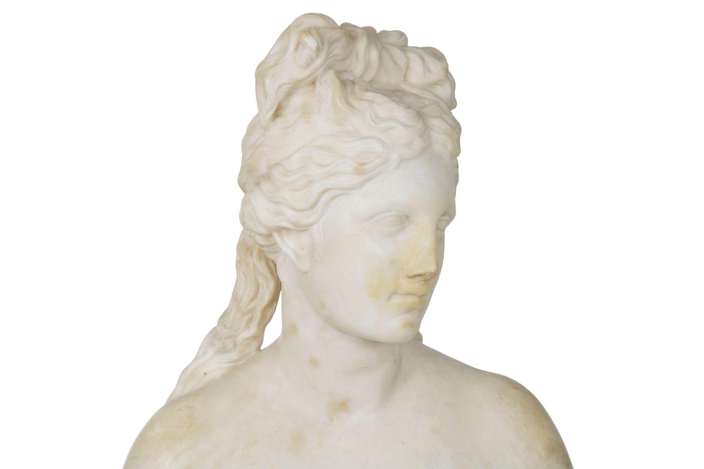 This Grand Tour bust of the Capitoline Venus was carved after the antique, the work is signed on the integral plinth V. Campidoglio and was executed during the second half of the 19th century. It is captures Aphrodite immediately before taking a