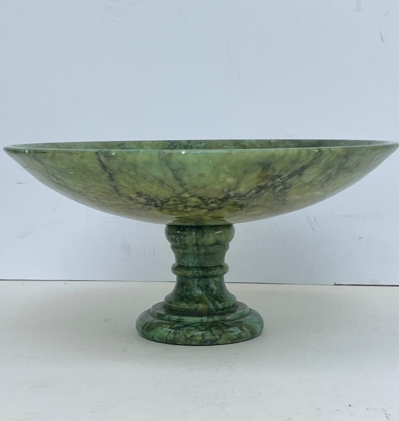 Italian 19th Century Green Marble Pedestal Bowl.

Neoclassical style marble tazza centerpiece from Florence, Italy. The marble bowls were an attractive souvenir for travelers on their Grand Tour. The elegant shape modeled after Antiquity is