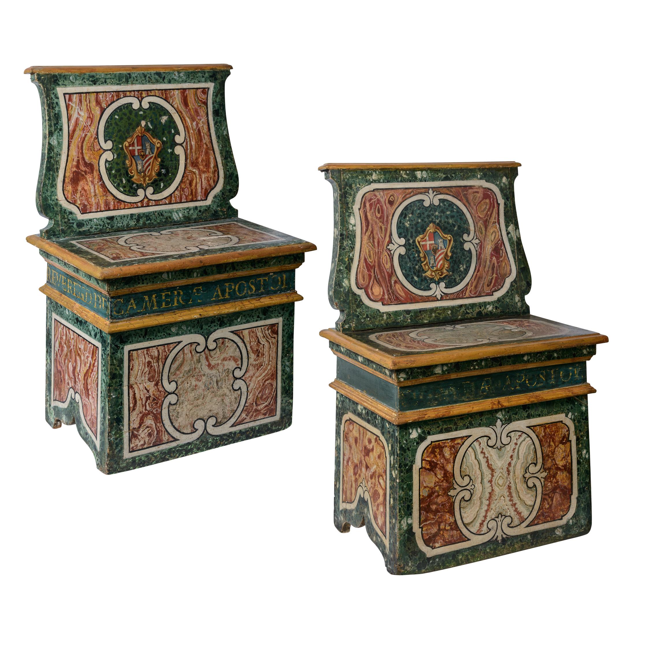 This is a wonderful example of a pair of Italian late  19th Century Wood Hand Painted Faux Marble Hall Chairs, with family Coat of Arms/ Armorials.
All sides are faux painted with faux marble decor, each cartouche is different. 
Very bright colors