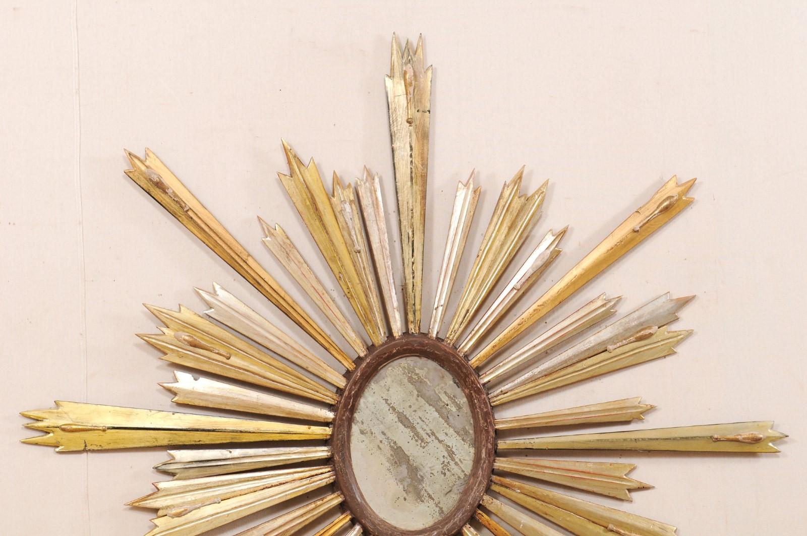 Carved Italian 19th Century Large Gilded Wood Sunburst with Antiqued Center Mirror