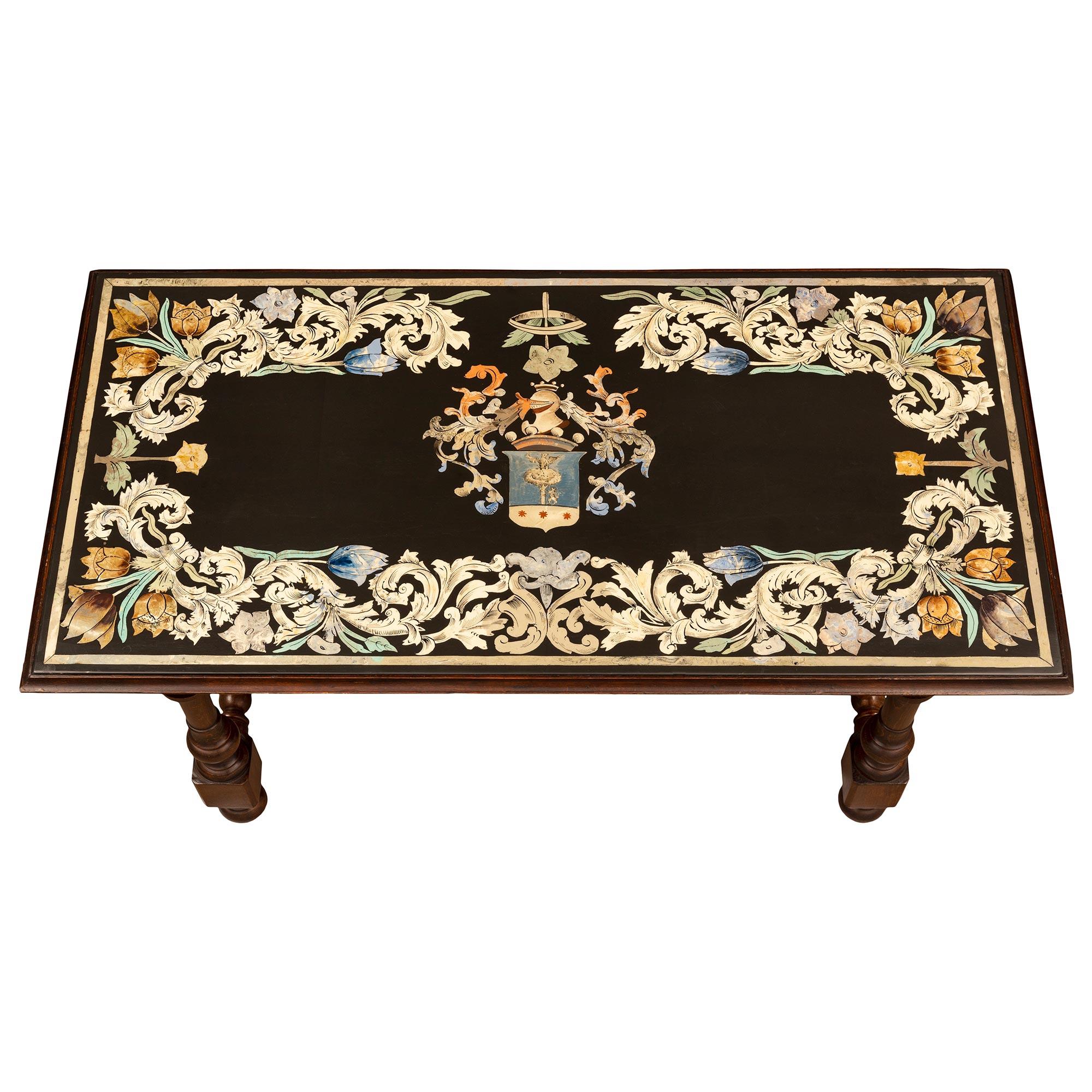 A handsome and extremely decorative Italian 19th century Louis XIV st. Walnut and Scagliola coffee table. The rectangular table is raised by four elegant turned legs with lovely mottled designs and block reserves connected by a turned H shaped