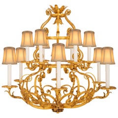Lampadario italiano del XIX secolo in metallo dorato Luigi XV St.