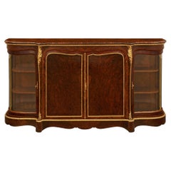 Italian 19th century Louis XV st. Olivewood, Ormolu and Glass buffet