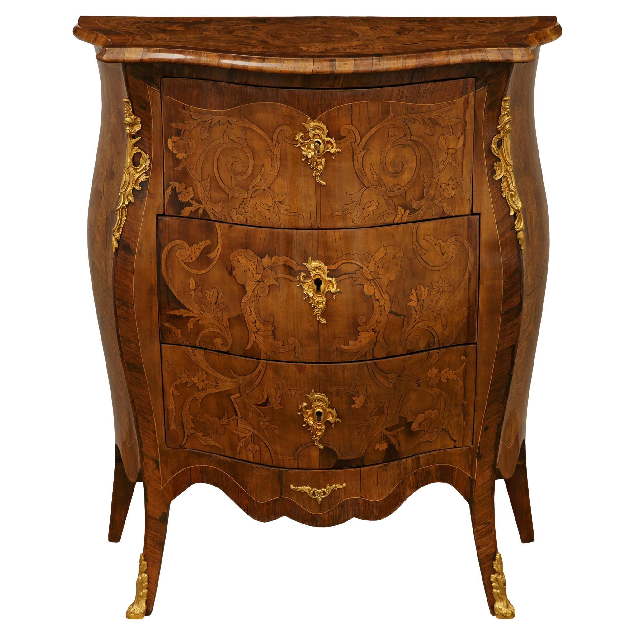 Italian 19th century Louis XV st. Walnut and Ormolu commode