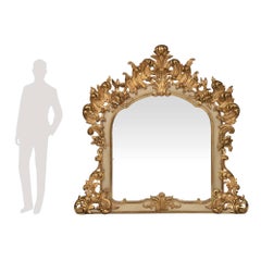Miroir italien de style Louis XV du 19ème siècle, patiné en bois blanc cassé et doré