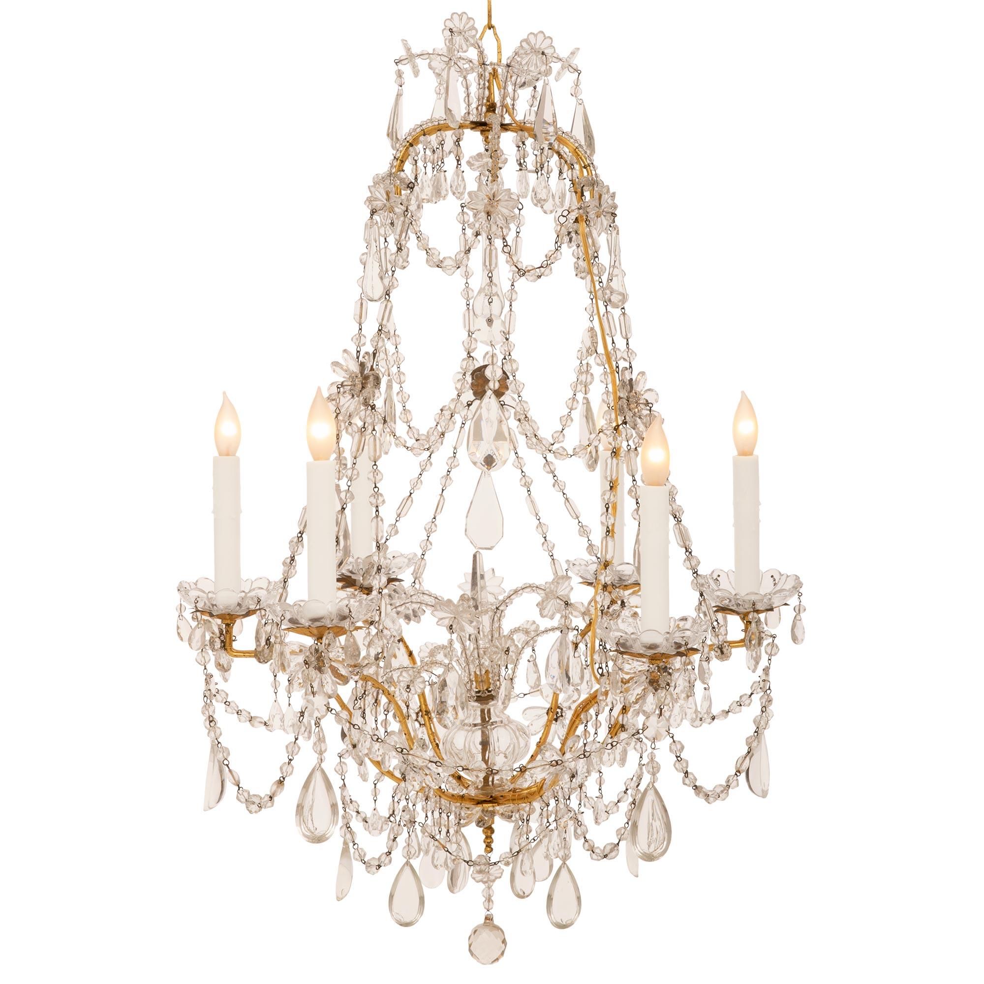 Italian 19th Century Louis XVI St. Gilt Metal And Crystal Chandelier In Good Condition For Sale In West Palm Beach, FL