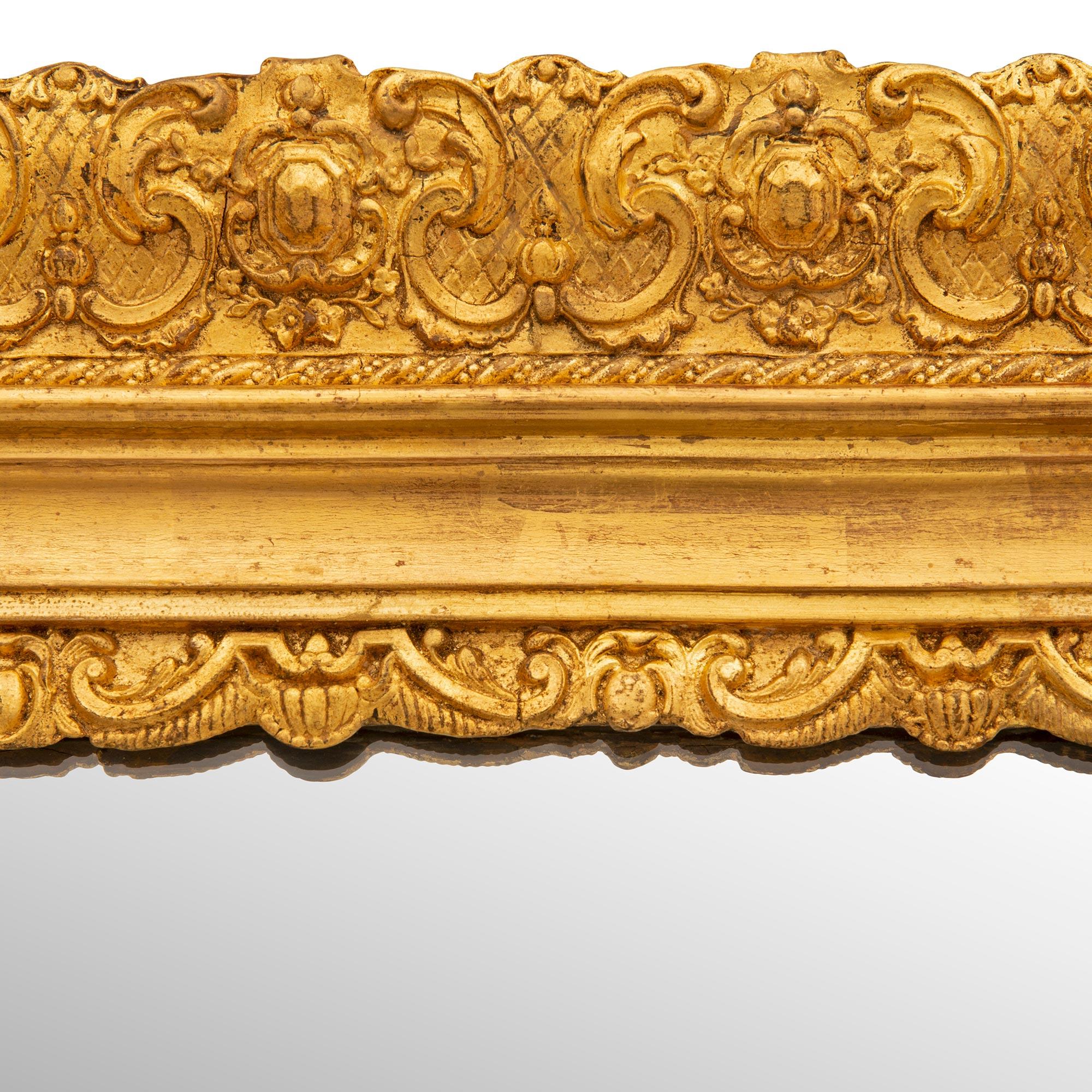 Miroir italien du 19ème siècle en bois doré de style Louis XVI en vente 1
