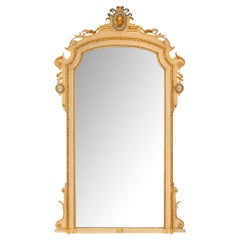 Italian 19th century Louis XVI st. patinated and Giltwood mirror