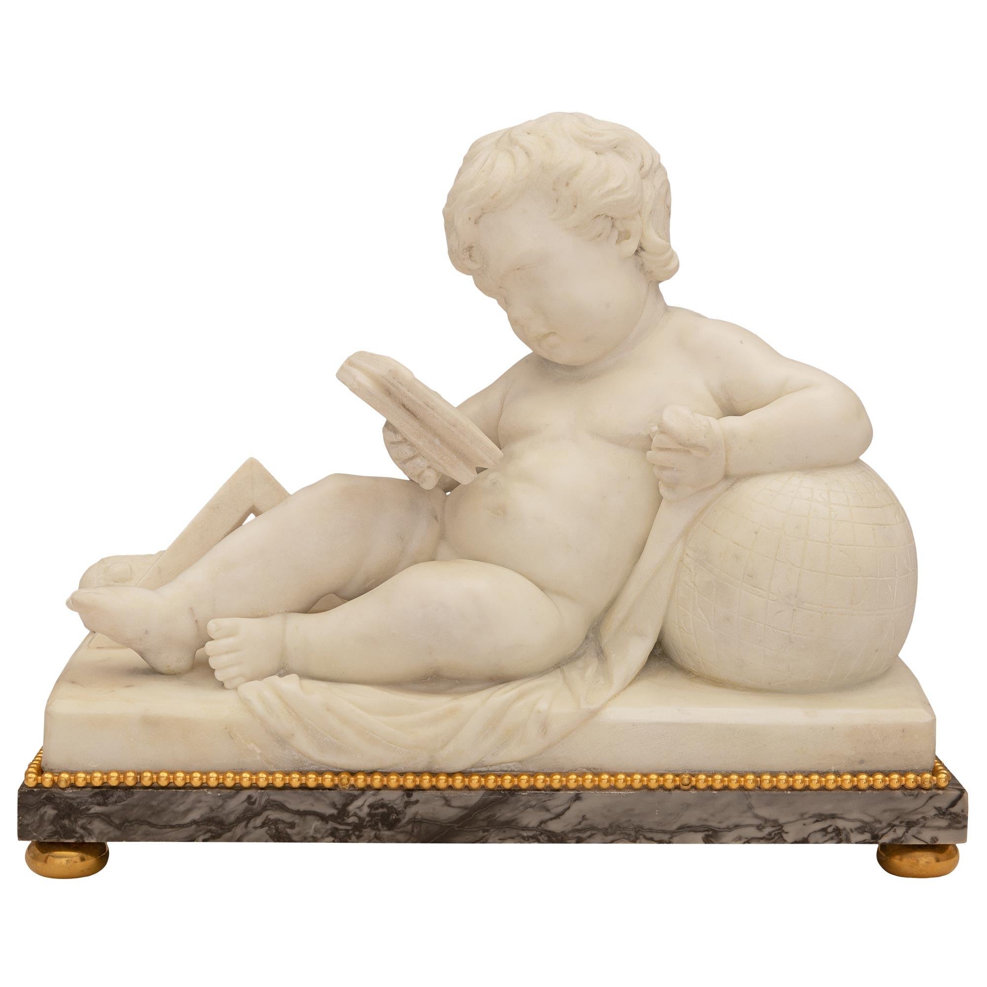 A charming and wonderfully executed Italian 19th century white Carrara marble, Gris St. Anne marble, and ormolu statue. The statue is raised by elegant ormolu bun feet below the rectangular Gris St. Anne marble base. The statue above depicts a young