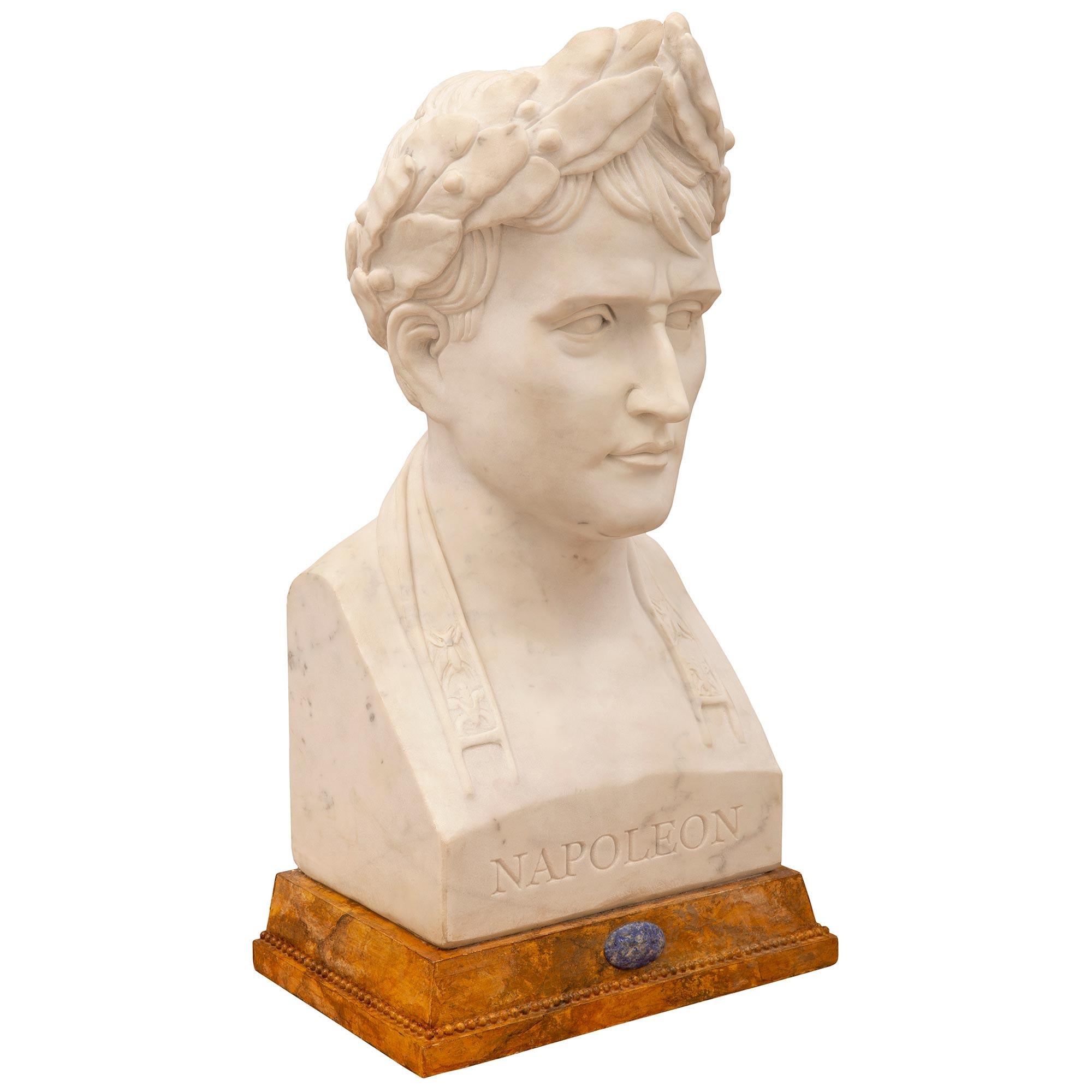 A handsome and wonderfully executed Italian 19th century neo-classical st. white Carrara marble and a faux painted marble bust of Napoleon. The bust is raised by an exceptional and most decorative faux painted Sienna marble mottled base with a fine