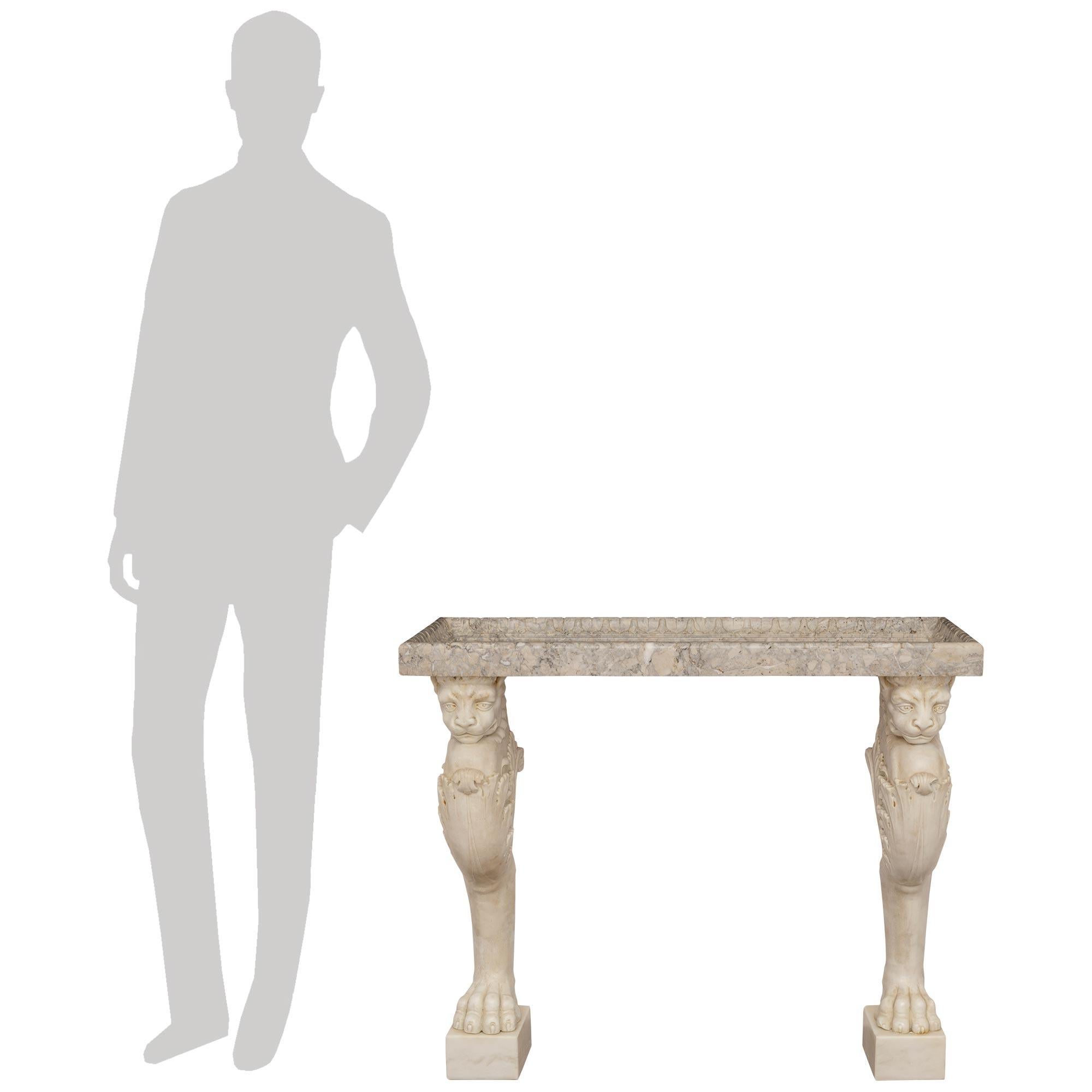 A handsome and most decorative Italian 19th century Neo-Classical st. white Carrara and Breccia Oniciata marble console. This wonderful wall mounted rectangular console is raised on stately Carrara marble block supports below the impressive legs