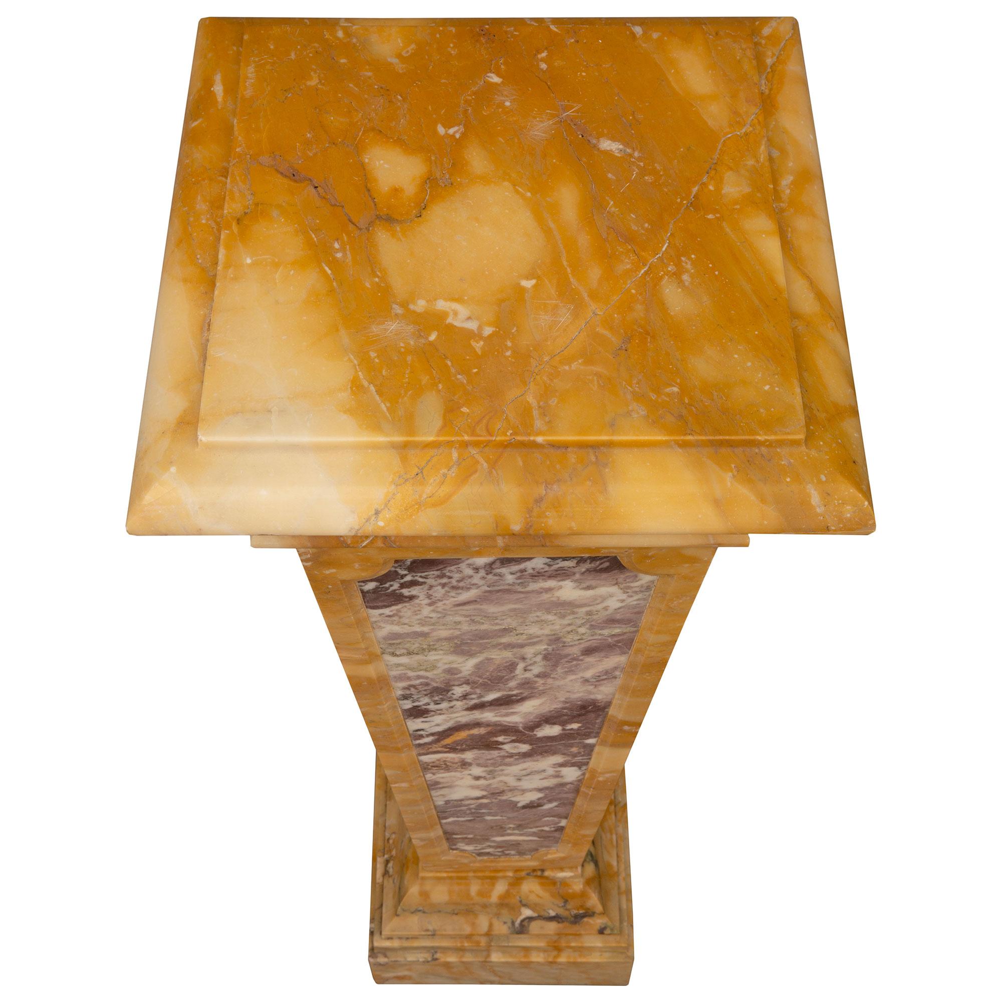 A most impressive Italian 19th century Neo-Classical st. Brèche Violette and Sienna marble pedestal column. The pedestal is raised by a fine square base with an elegant and most decorative stepped design. The square tapered central support displays