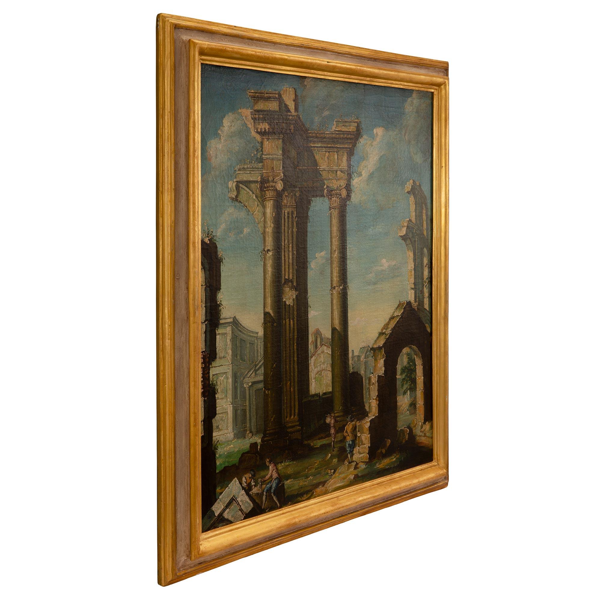 A most attractive Italian 19th century oil on canvas painting of ruins and figures. The two figures at the bottom left are engaging with each other while a man is watching another walking by holding his bag. The figures are amidst wonderful