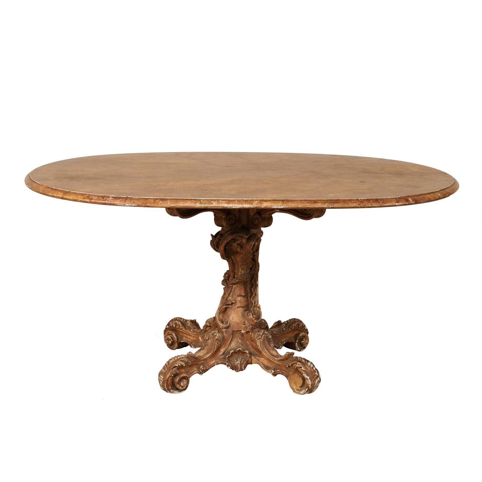 Italian 19th Century Oval Pedestal Table with Carved Wood Base in Warm Hues
