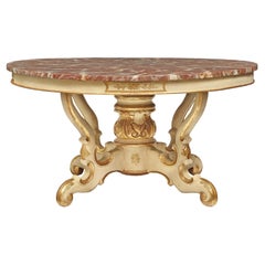 Table centrale italienne du 19ème siècle patinée et dorée