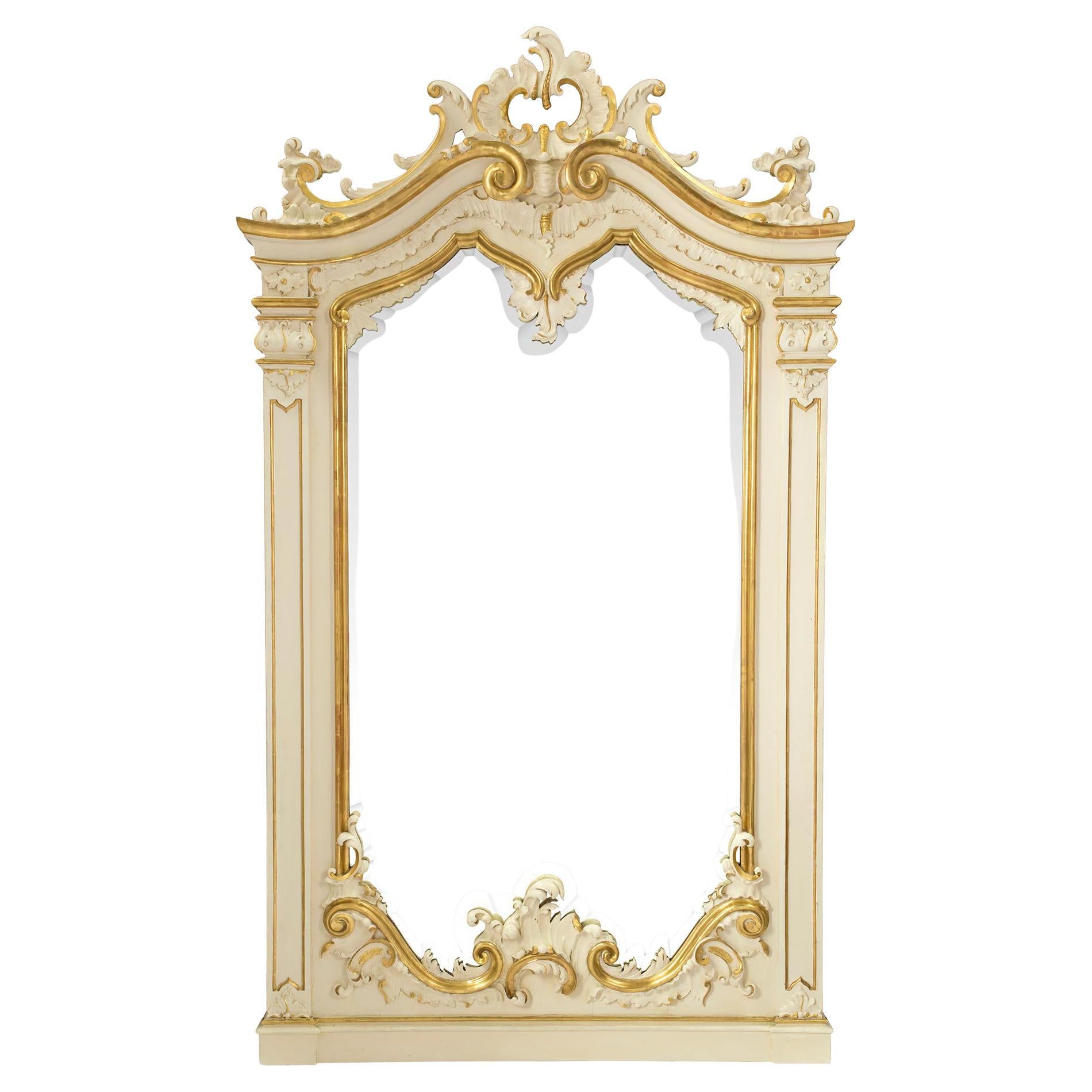 Miroir vénitien italien patiné et doré du XIXe siècle