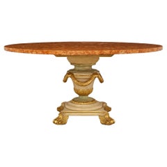 Mesa de centro/comedor italiana del siglo XIX de madera patinada, mármol y dorado.