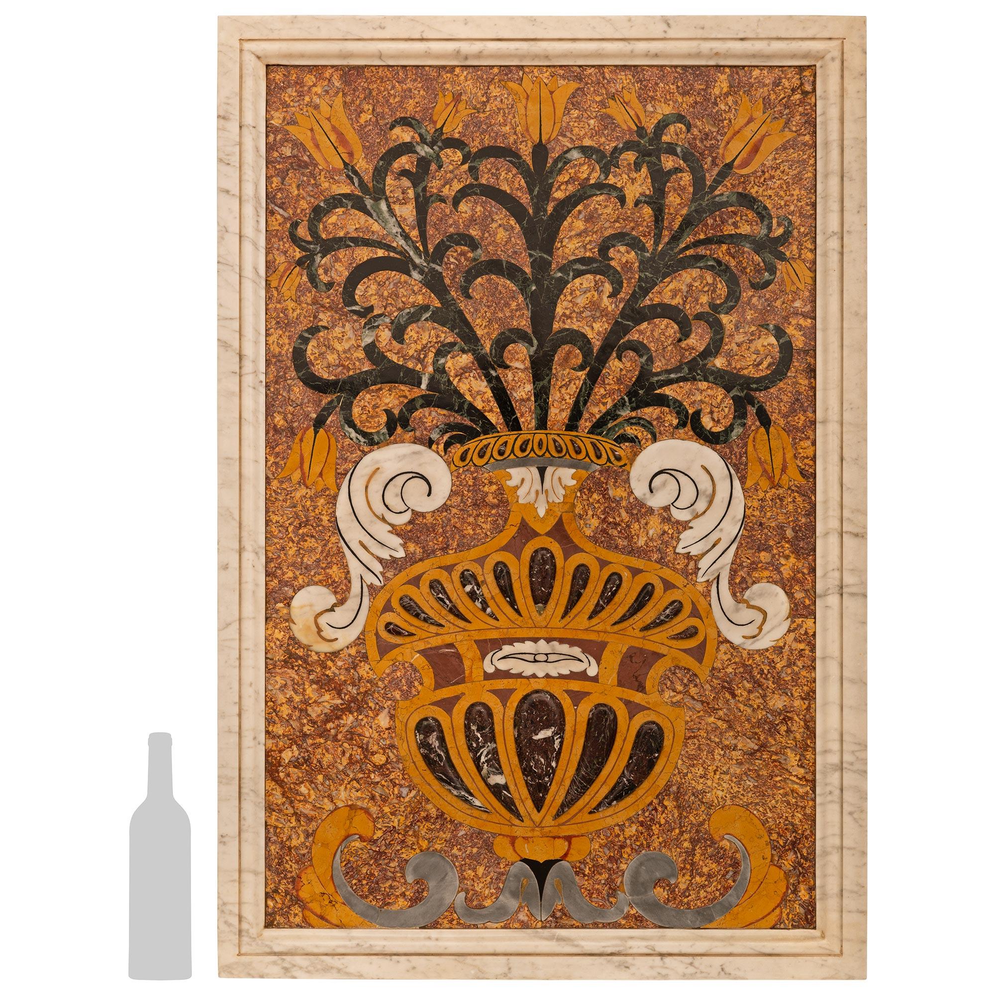 A sensational and large scale Italian 19th century Pietra Dura marble plaque/wall decor. This stunning plaque is set on a Brocatelle d'Espagne marble background set within a mottled white Carrara marble frame. The plaque displays exceptional