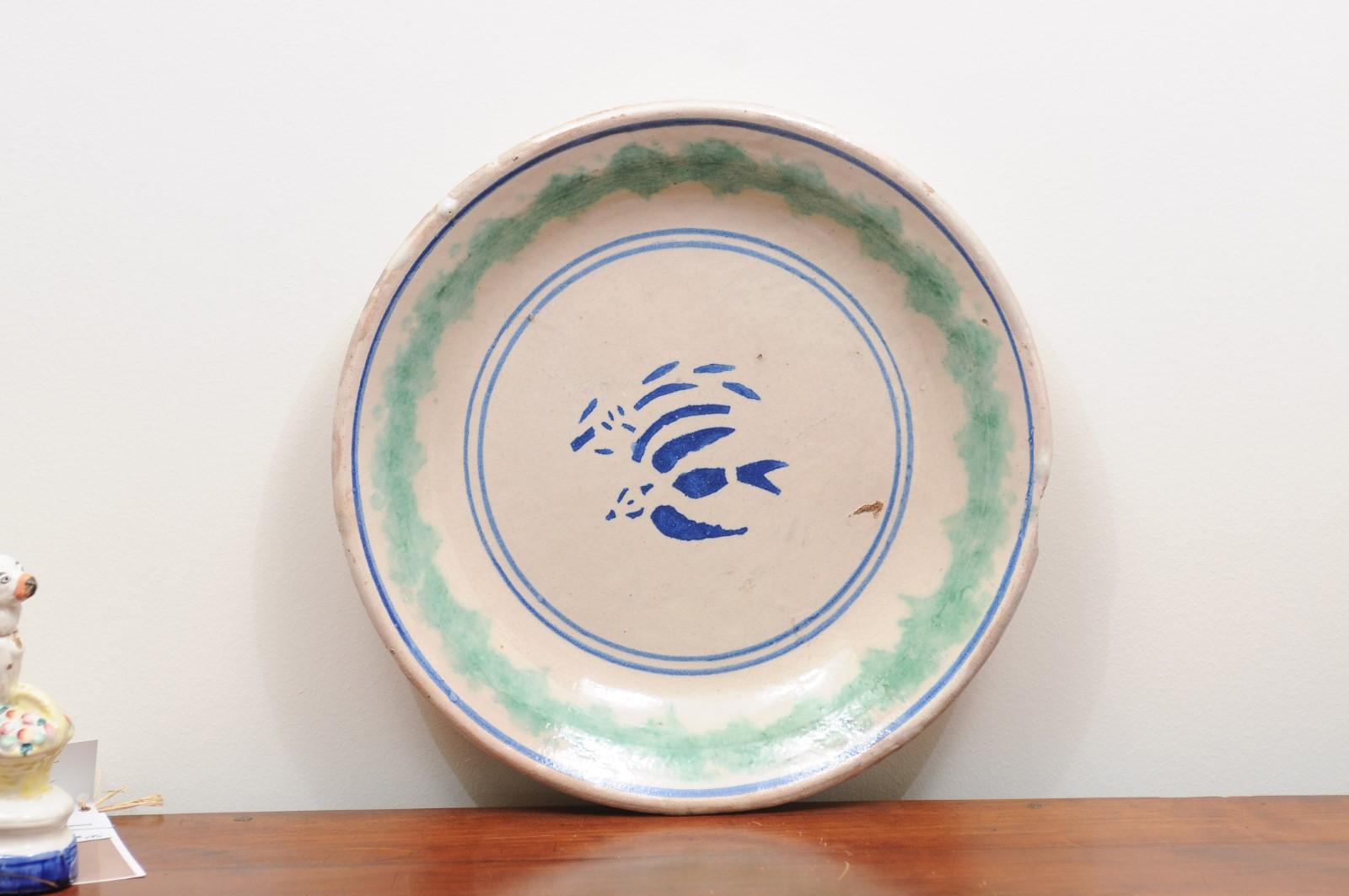 Pottery Italian 19th Century Plate with Stylized Blue Bird Motifs and Green Accents
