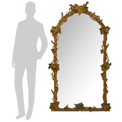 Italian 19th century Polychrome, patinated Wood and Gilt mirror