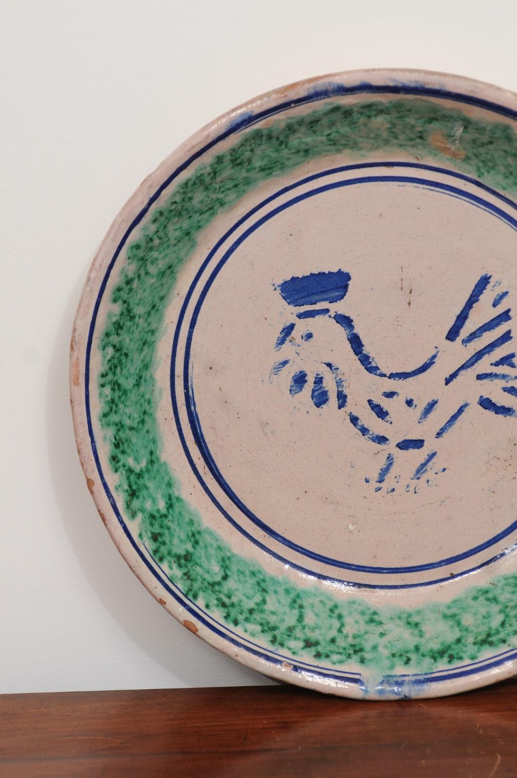 Italian 19th Century Pottery Plate with Blue Stylized Rooster and Green Accents In Good Condition In Atlanta, GA