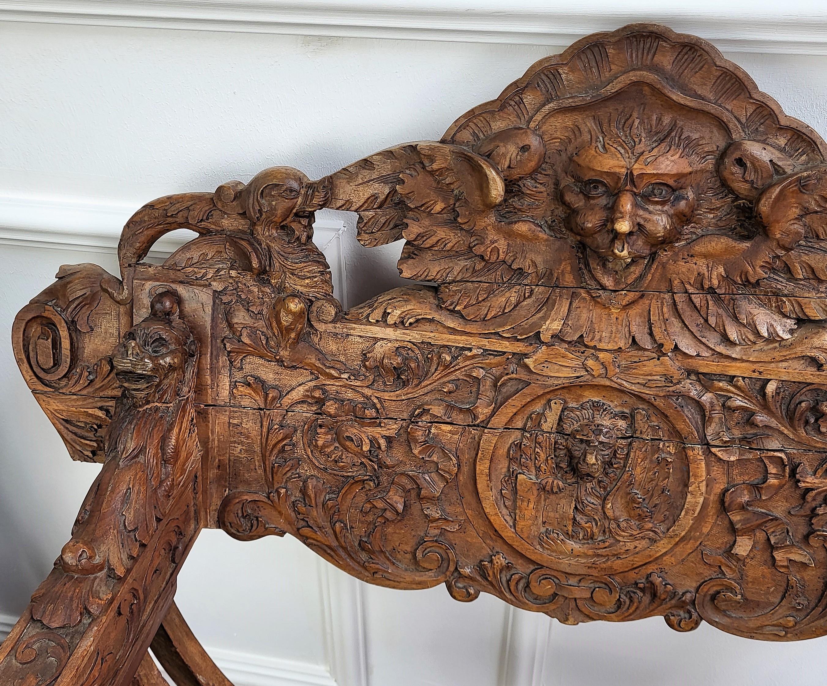Hand-Carved Italian 18th Century Renaissance Savonarola Chair in Amazingly Carved Walnut For Sale
