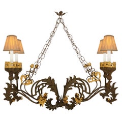 Italian 19th century Renaissance st. patinated Iron and Gilt chandelier