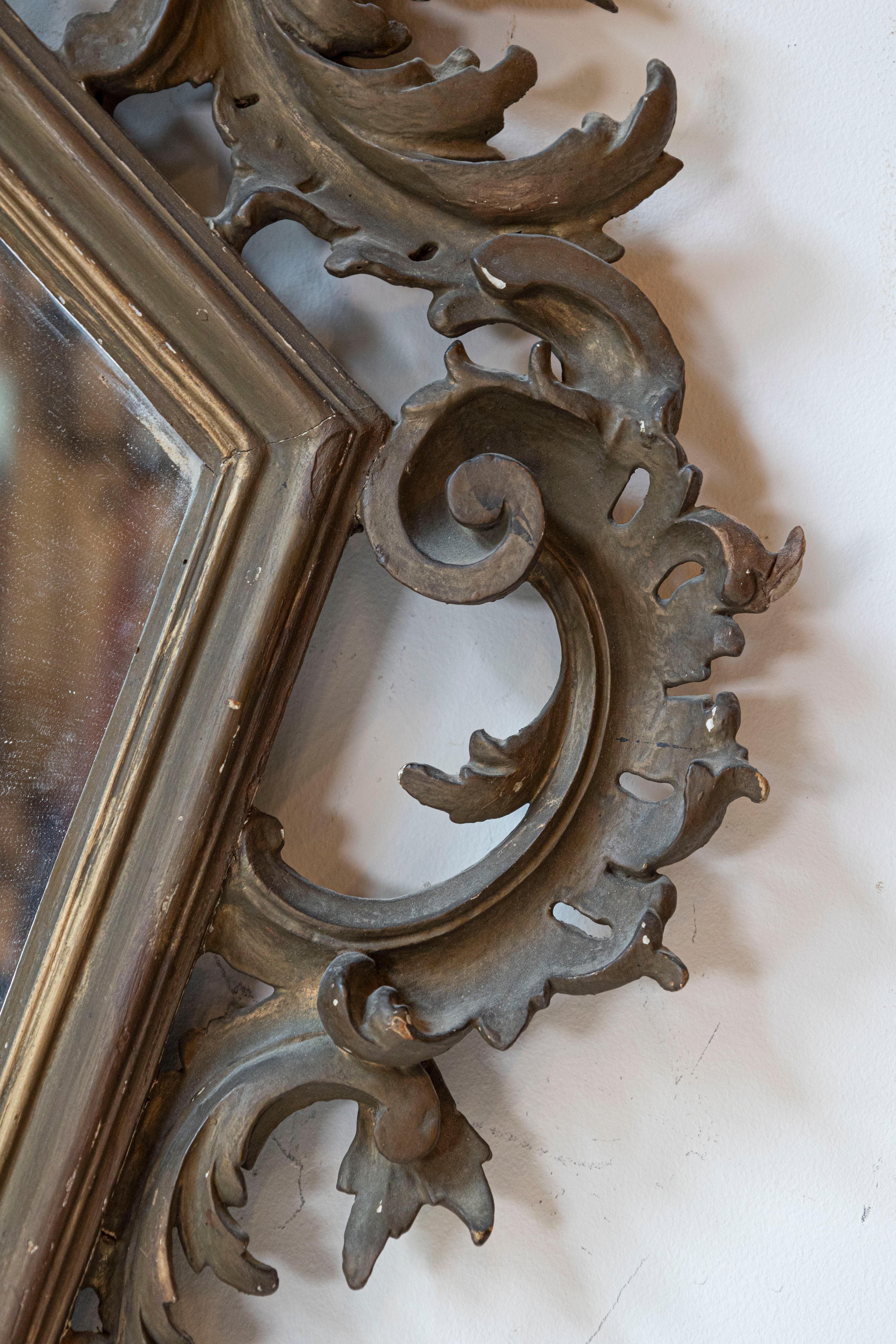 Italian 19th Century Rococo Style Carved Mirror with Traces of Gilt and Scrolls In Good Condition For Sale In Atlanta, GA