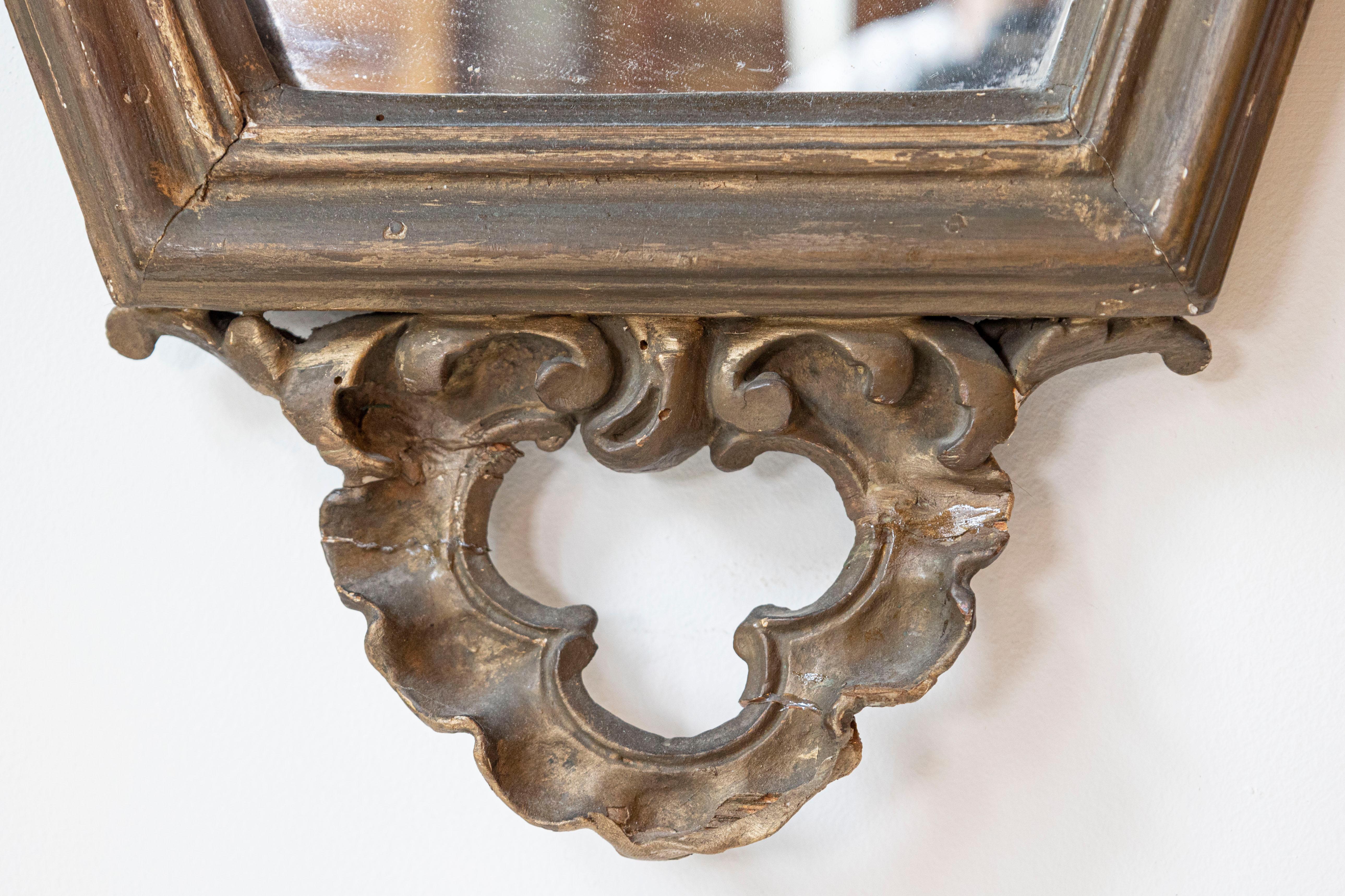 Italian 19th Century Rococo Style Carved Mirror with Traces of Gilt and Scrolls For Sale 1