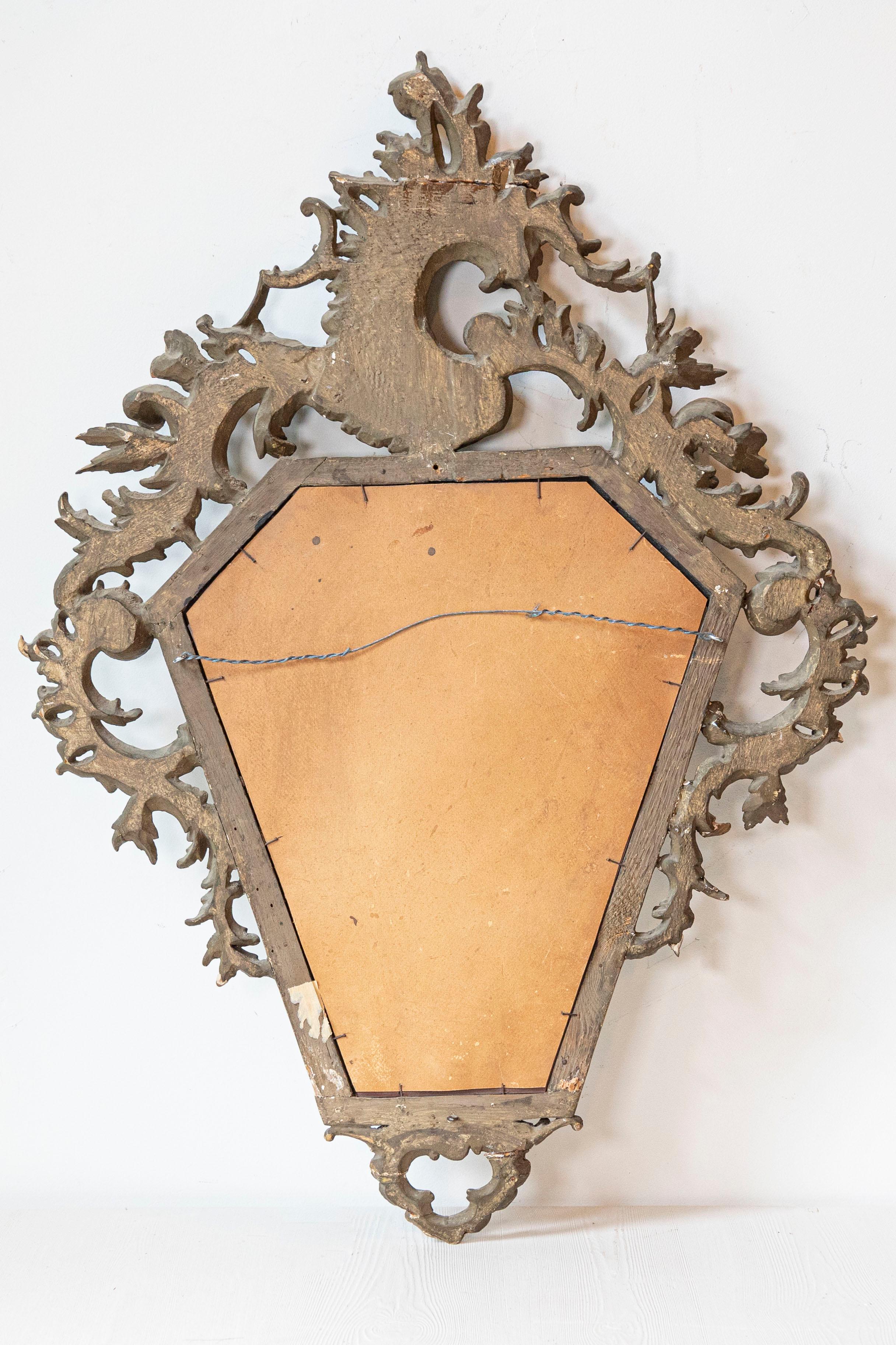 Italian 19th Century Rococo Style Carved Mirror with Traces of Gilt and Scrolls For Sale 4