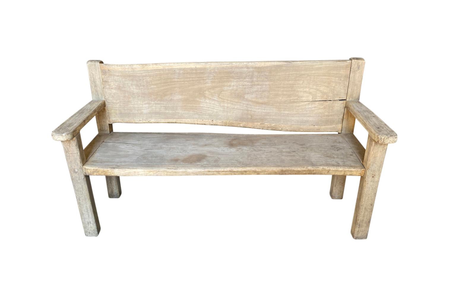 A charming 19th century rustic bench from Northern Italy. Soundly constructed from chestnut. Wonderful for any modern or rustic environment. The seat height is 18 1/2