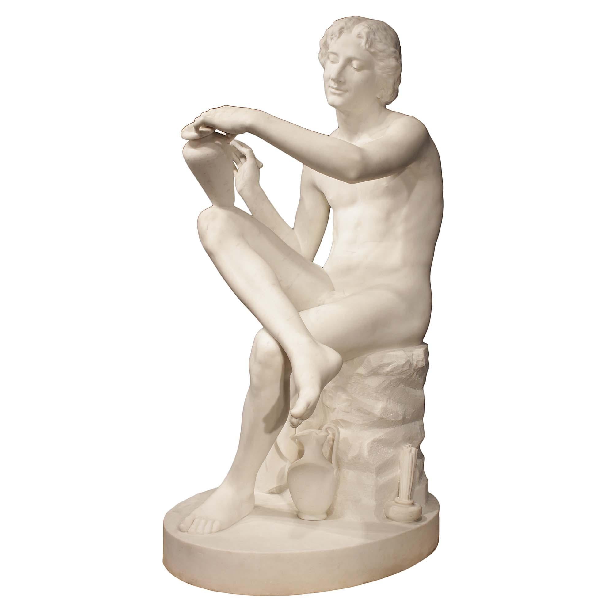 A very impressive Italian 19th century solid white Carrara marble sculpture, signed S. Schroeder 1875. The statue is raised on a circular base depicting a draped artist, seated with his leg crossed, perusing his work. He holds a vase and other urns