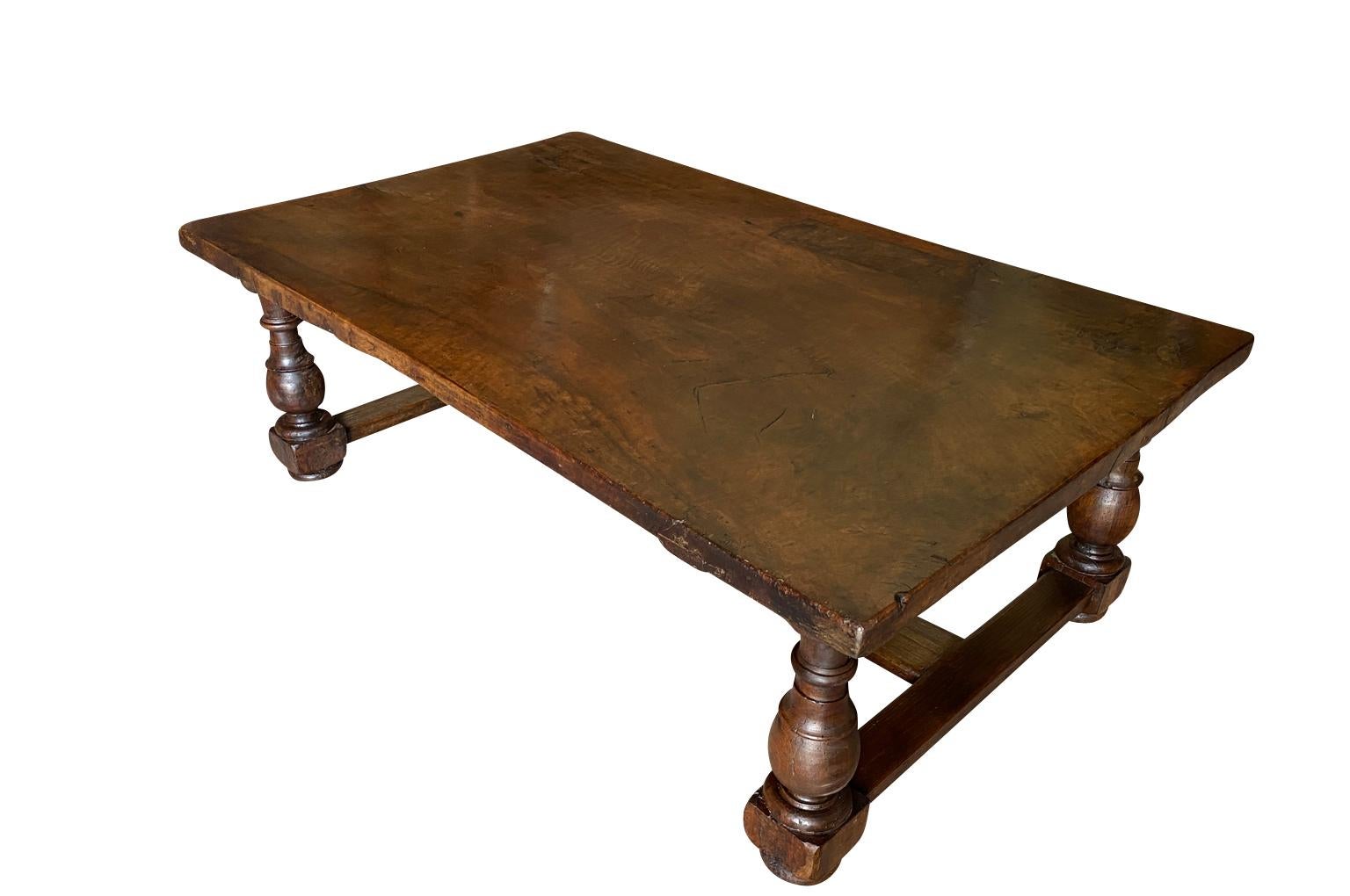 A very handsome mid-19th century Table Basse - Coffee Table from the Bologna region of Italy.  Soundly constructed from walnut and chestnut with a solid board top and nicely turned legs.  Beautiful patina - warm and luminous. 