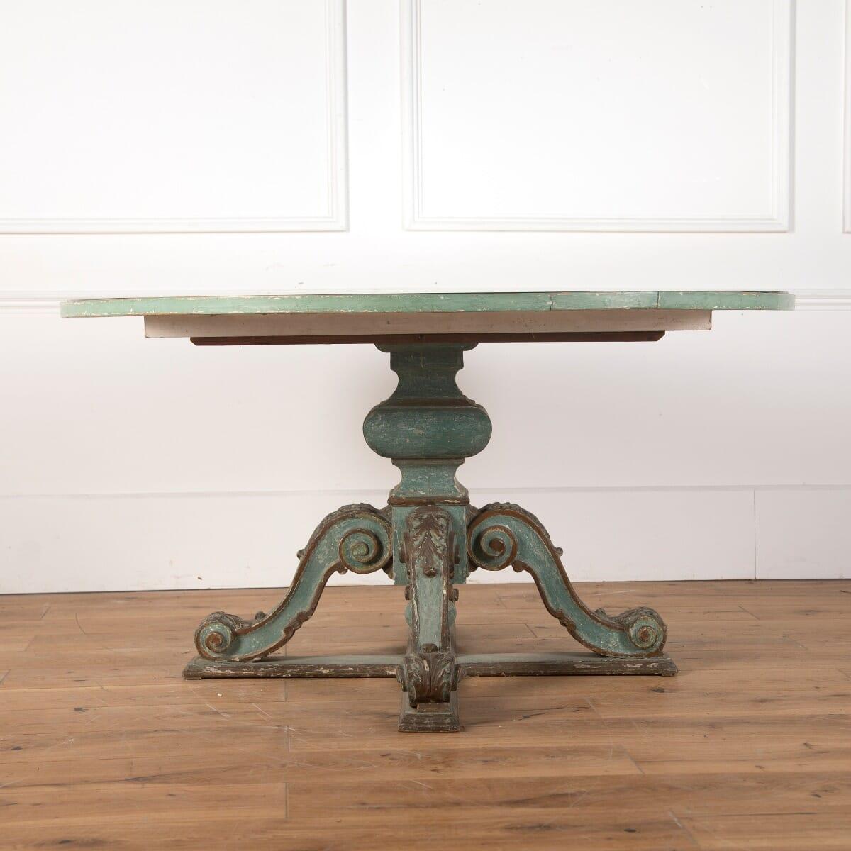 Italian 19th century painted centre table, with its original silvered mirrored top. 

This decorative table rests on a pronounced triform base, with elegant cabriole legs featuring volute and acanthus carving. 

The base has lovely blue-green
