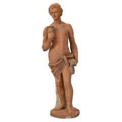 Statue italienne en terre cuite du 19ème siècle d'un jeune Bacchus