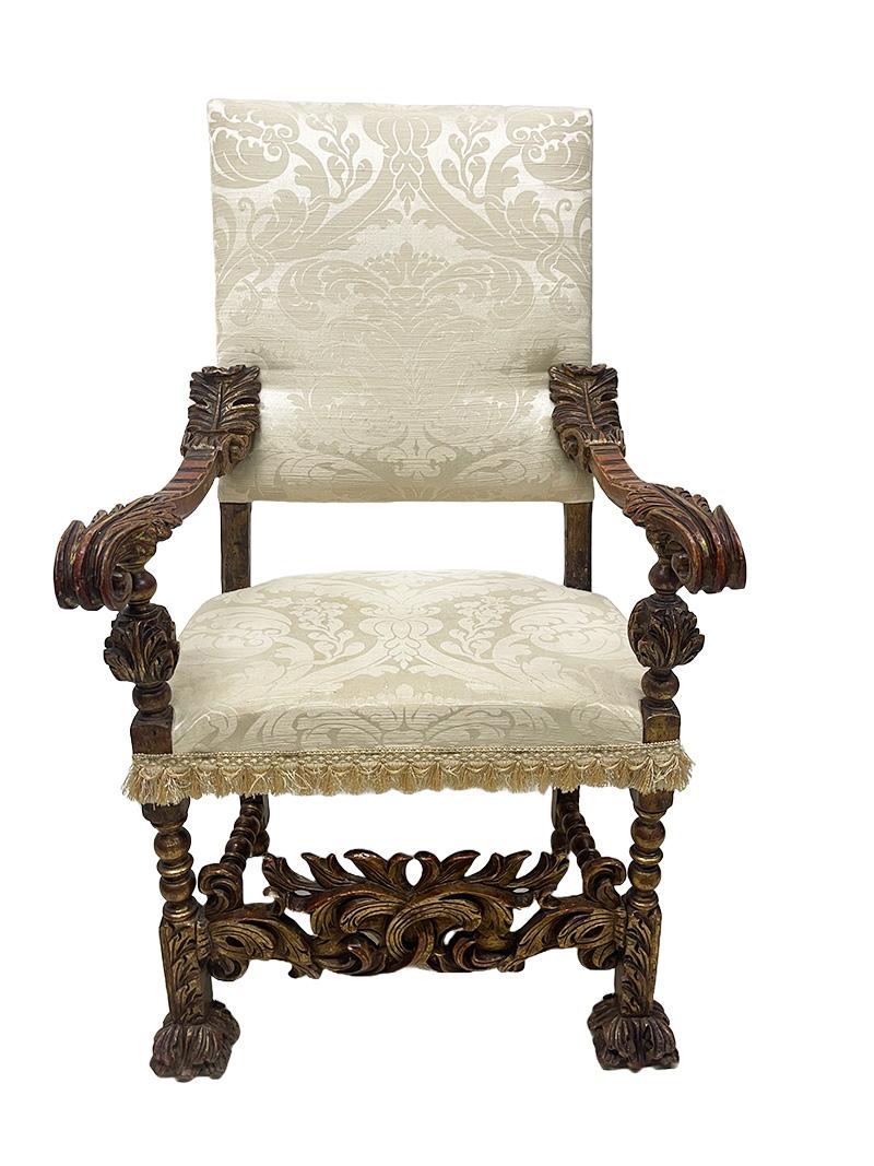 Italian 19th Century Throne armchair

Italian carved pine Throne chair with high backrest and acanthus leaves in red brownish gilded pinewood. The upholstery is Jacquard cream white with fringes. ( upholstery has signs of wear). 
The measurement is