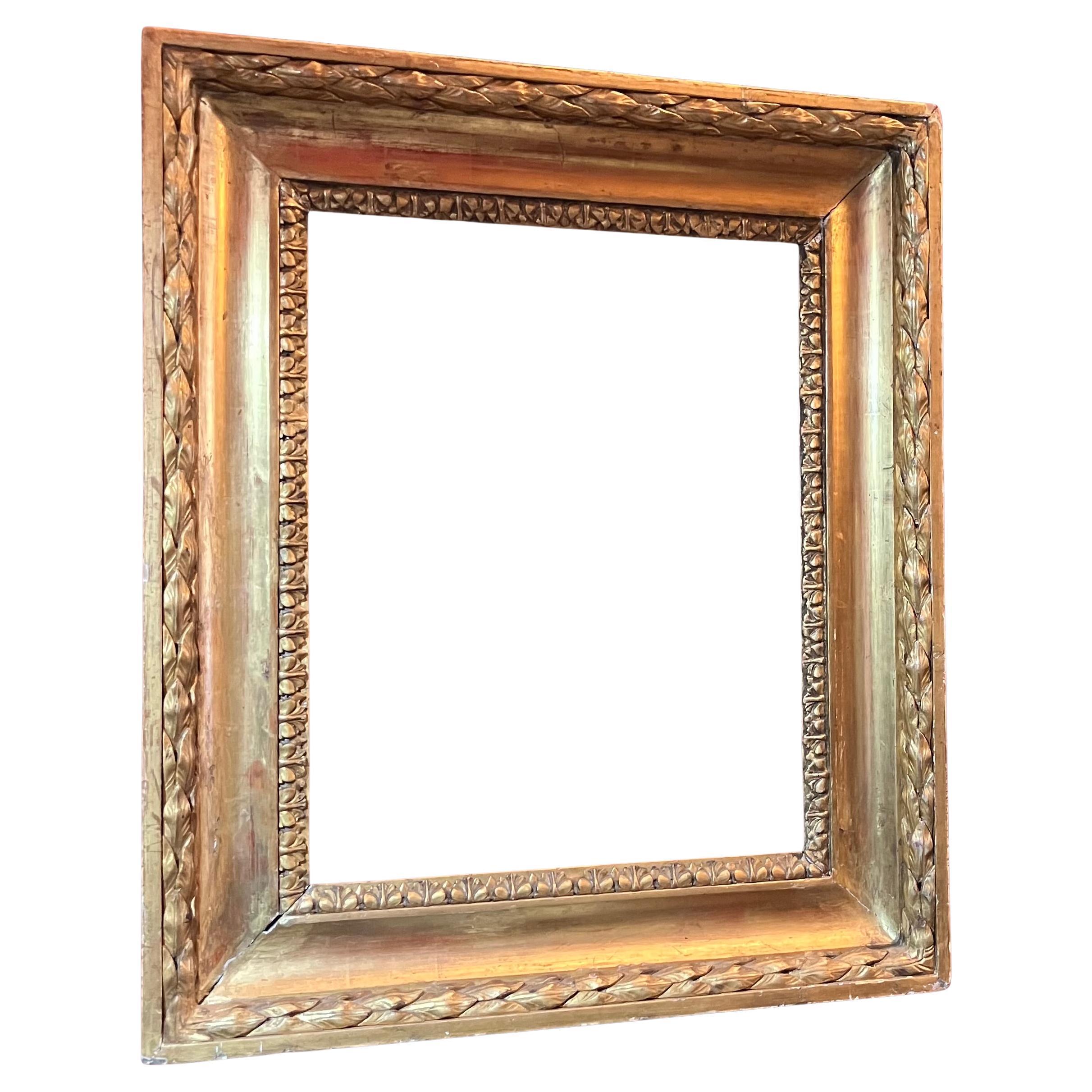 Cadre toscan en bois doré sculpté à la feuille d'or, période Empire, Italie, 19e siècle