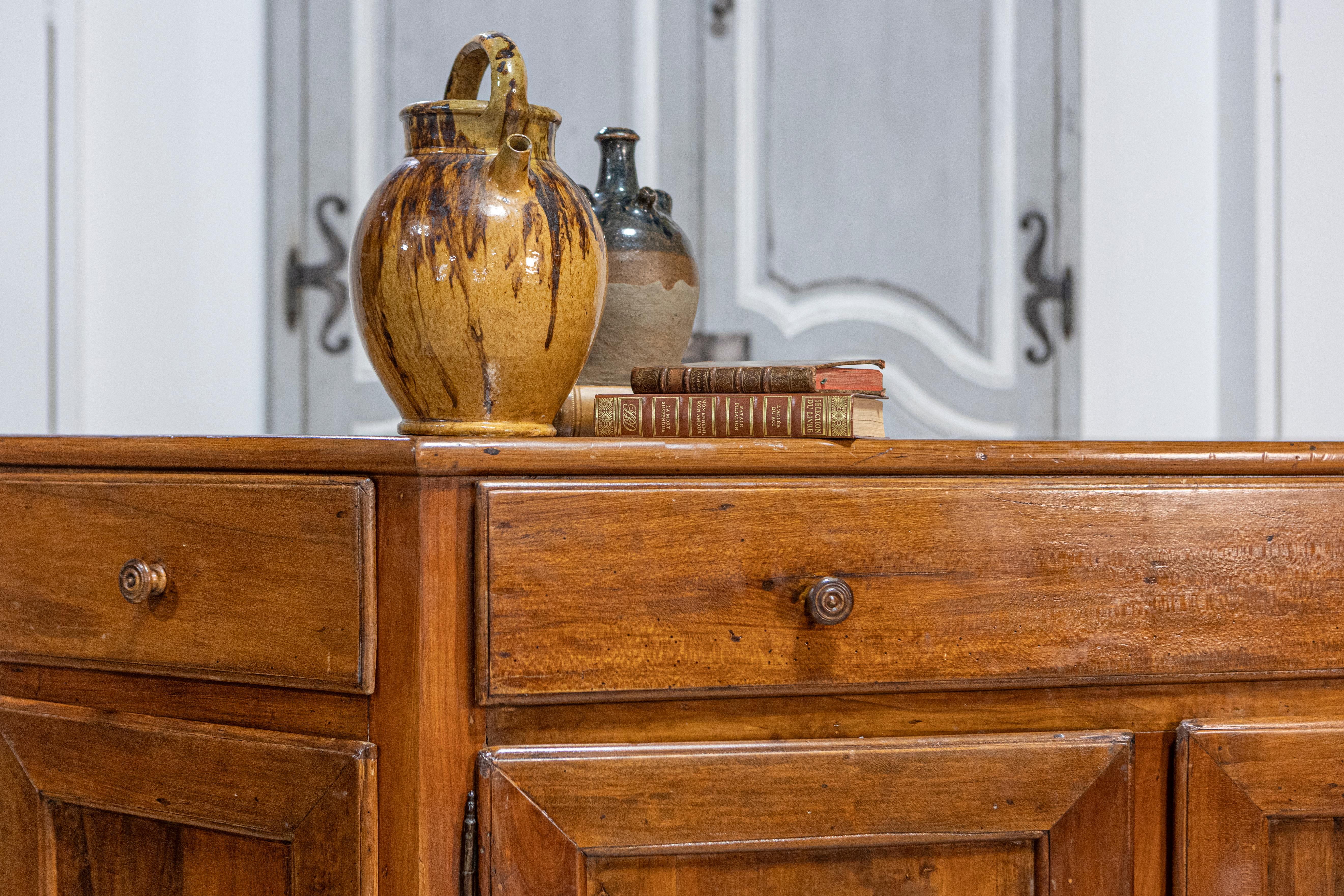 Italian 19th Century Walnut Credenza with Drawers over Doors and Canted Sides For Sale 7