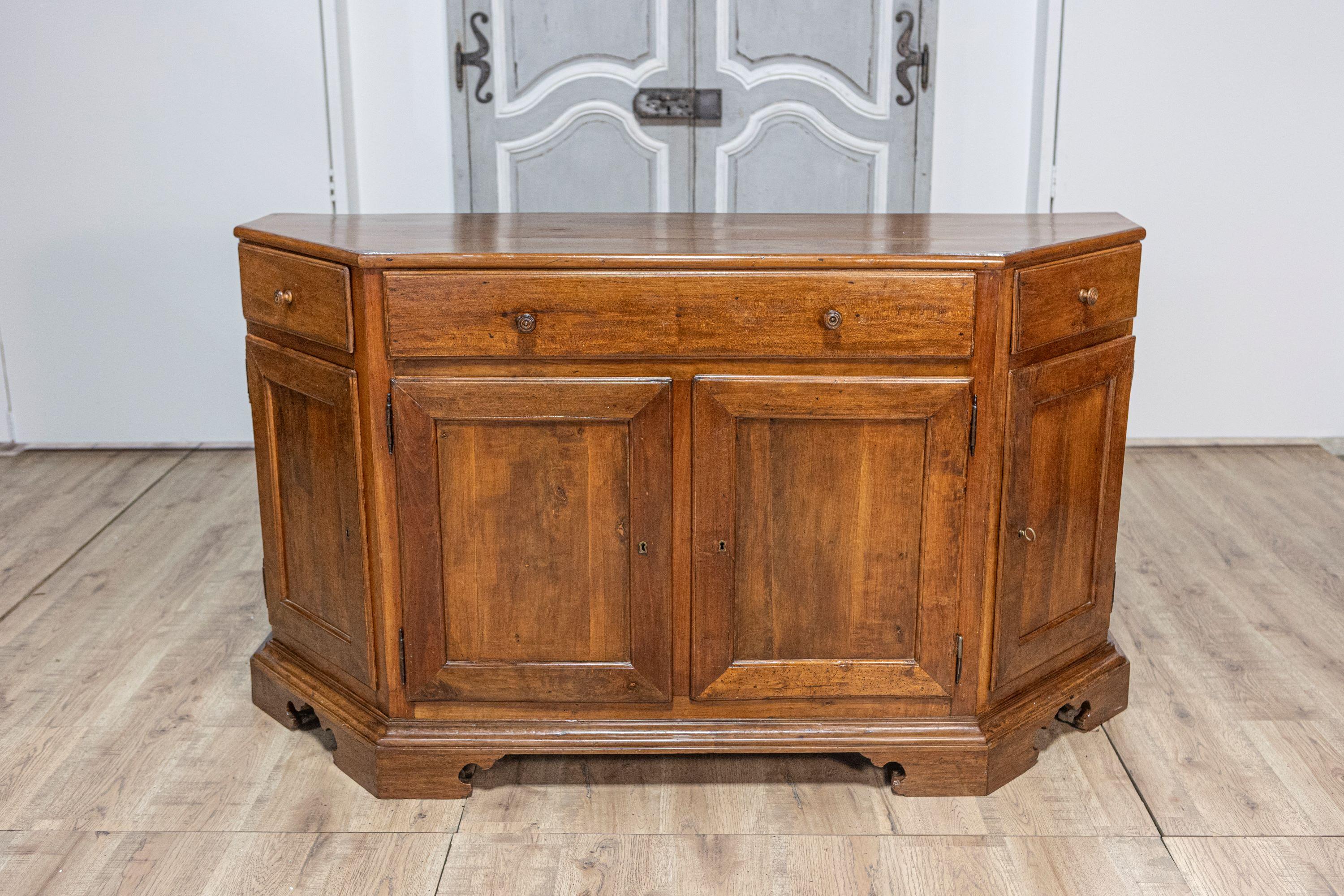Italian 19th Century Walnut Credenza with Drawers over Doors and Canted Sides For Sale 10