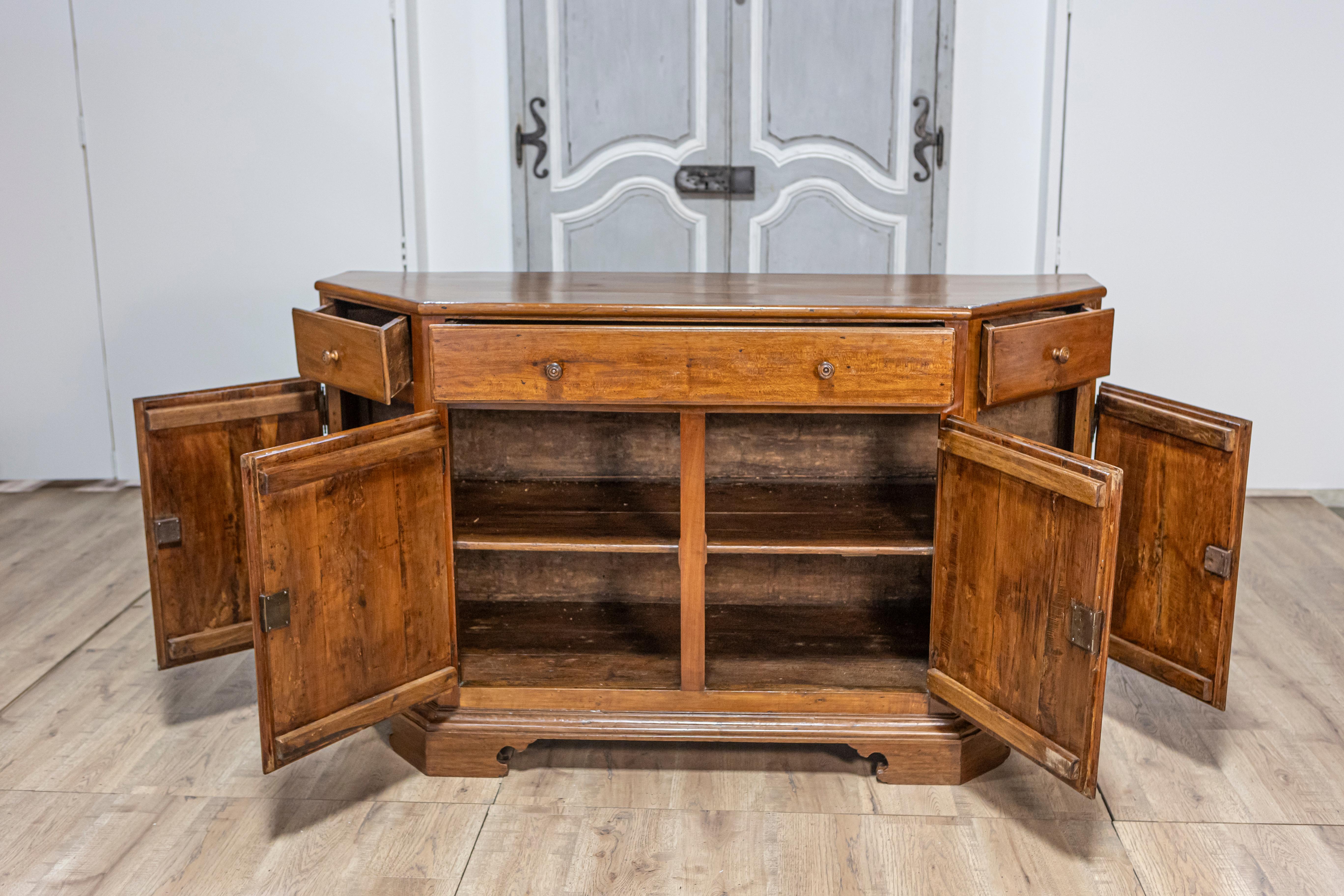 Italian 19th Century Walnut Credenza with Drawers over Doors and Canted Sides For Sale 12