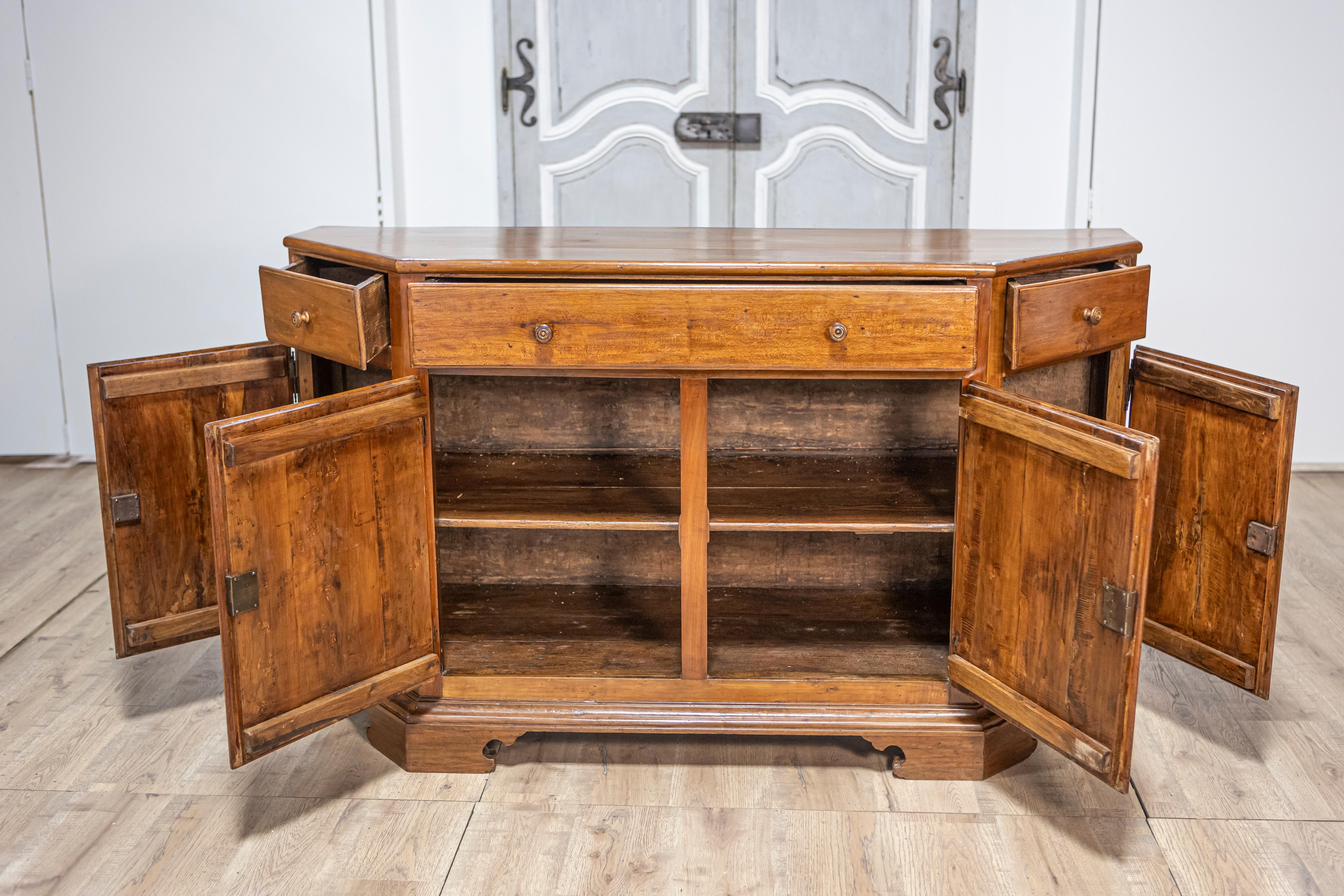 Italian 19th Century Walnut Credenza with Drawers over Doors and Canted Sides For Sale 2