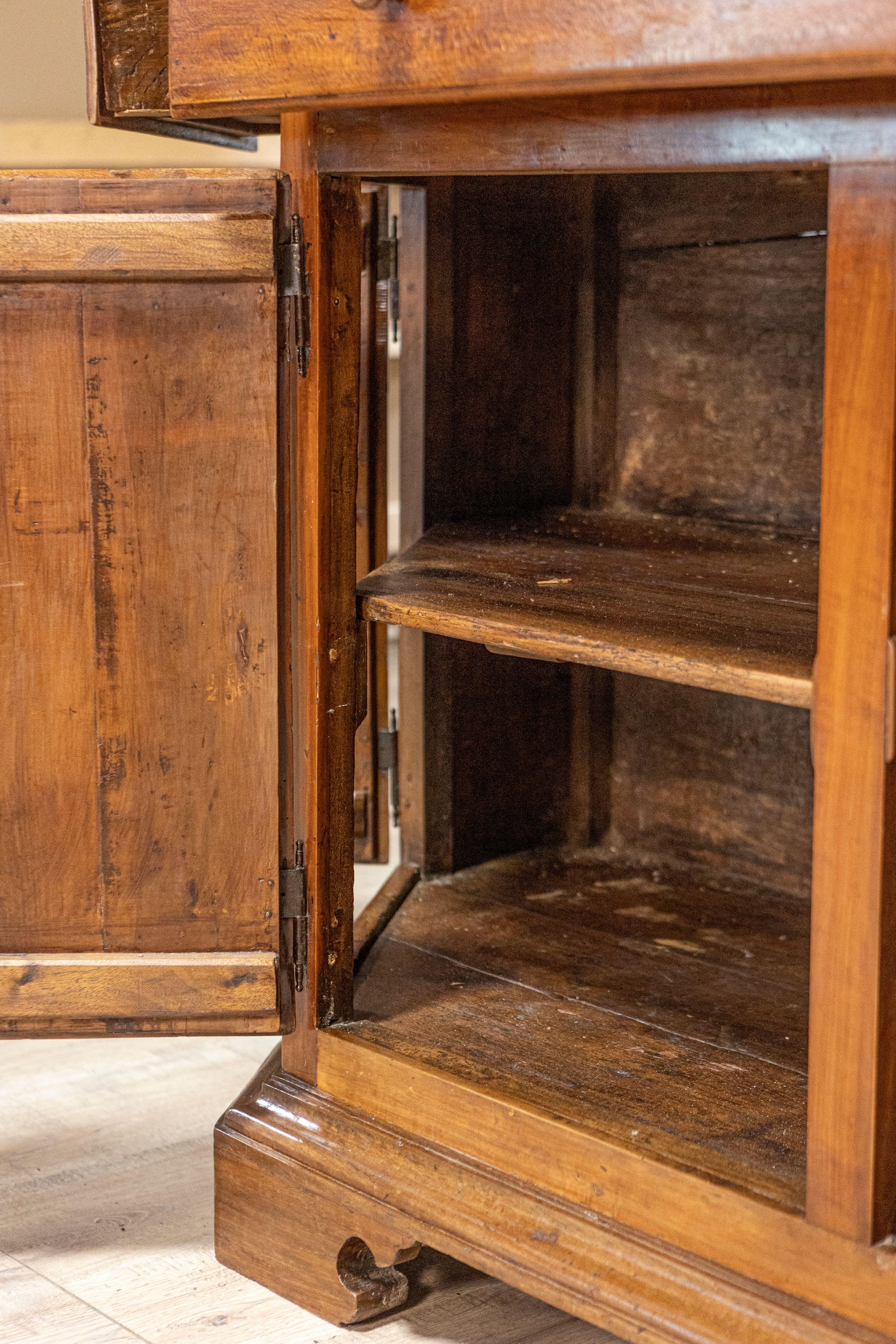 Italian 19th Century Walnut Credenza with Drawers over Doors and Canted Sides For Sale 5