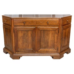 Antique Italian 19th Century Walnut Credenza with Drawers over Doors and Canted Sides