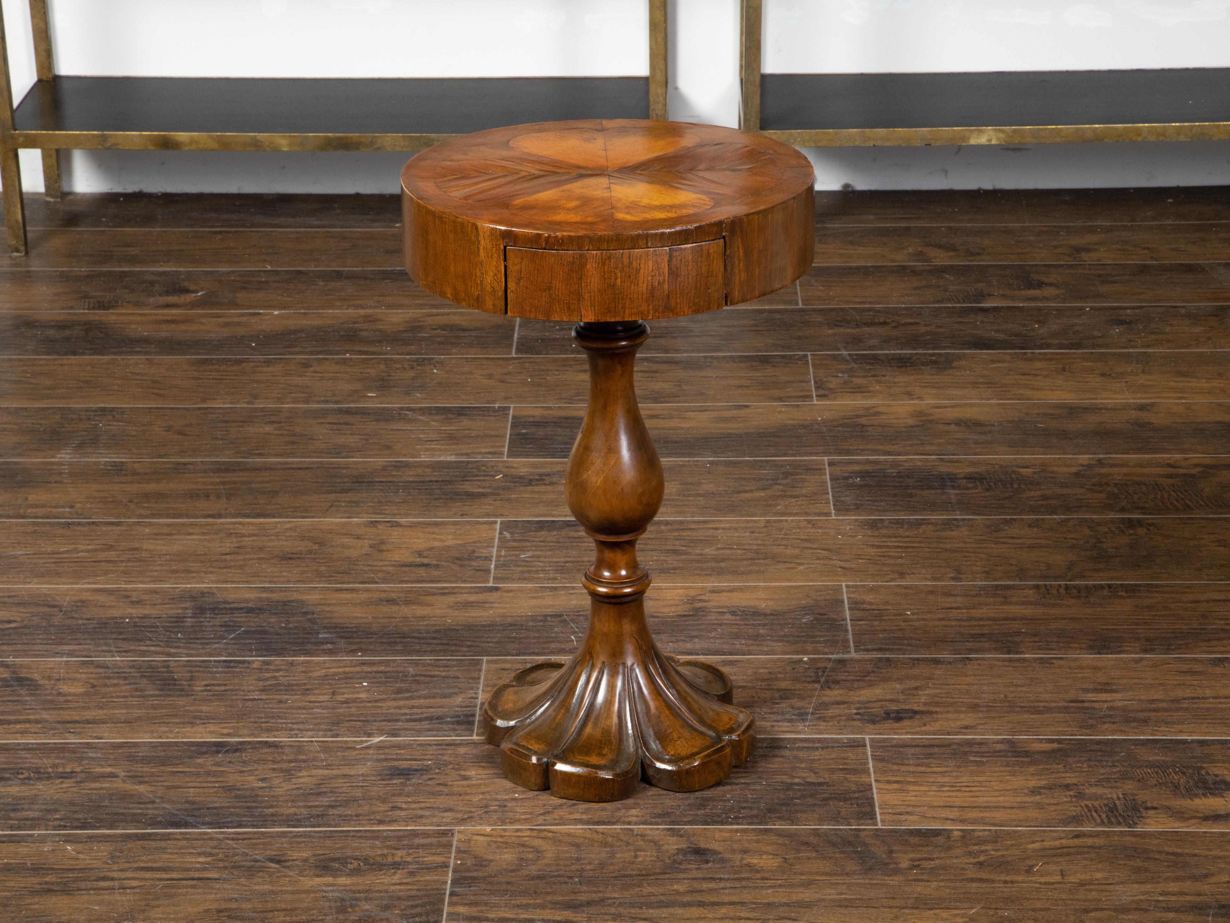 An Italian small walnut pedestal side table from the 19th century, with heart-shaped inlay and flaring base. Created in Italy during the 19th century, this pedestal table features a circular top adorned with heart-shaped inlay alternating dark and