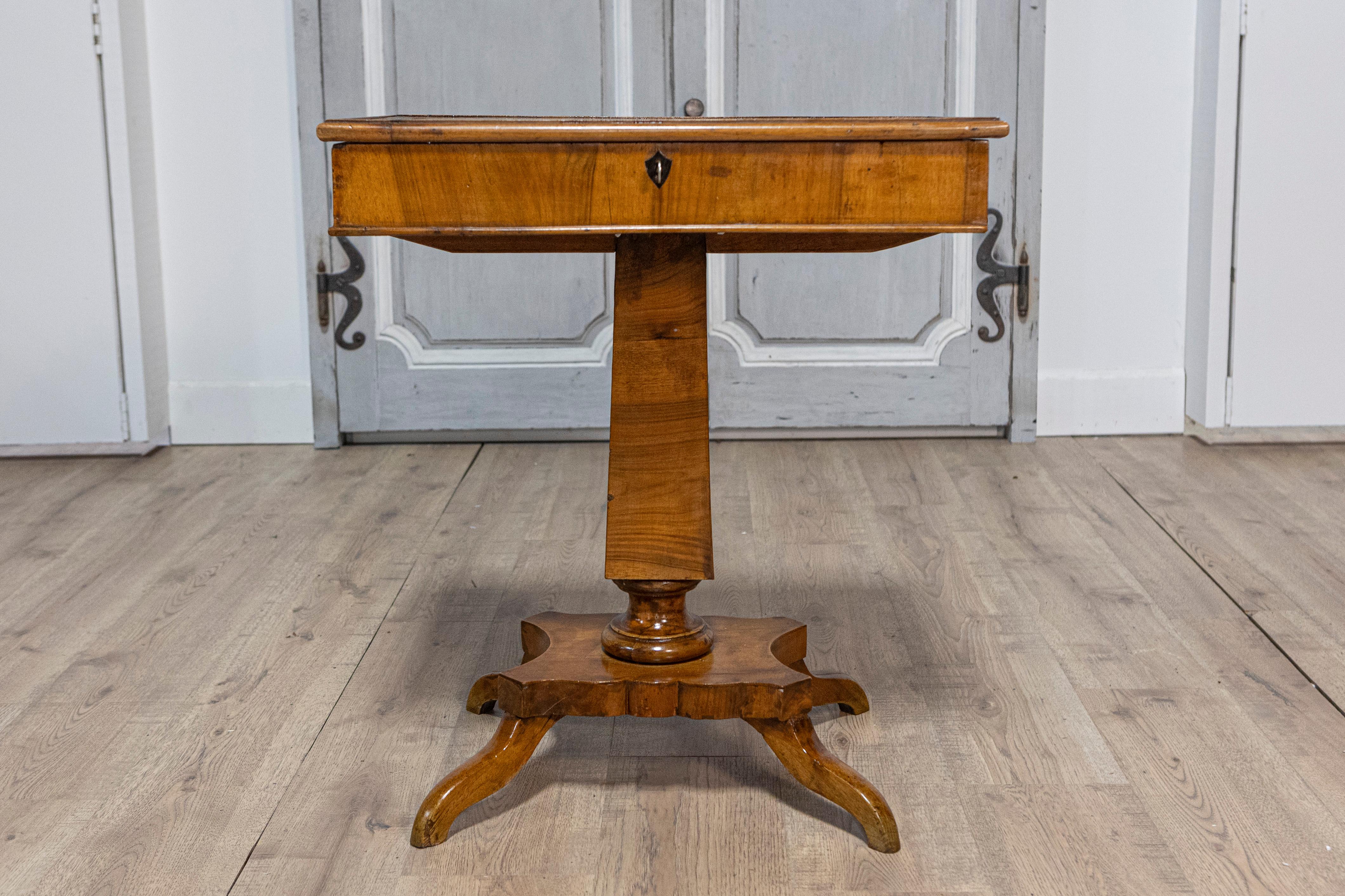 Carved Italian 19th Century Walnut Pedestal Table with Quadripod Base and Single Drawer For Sale